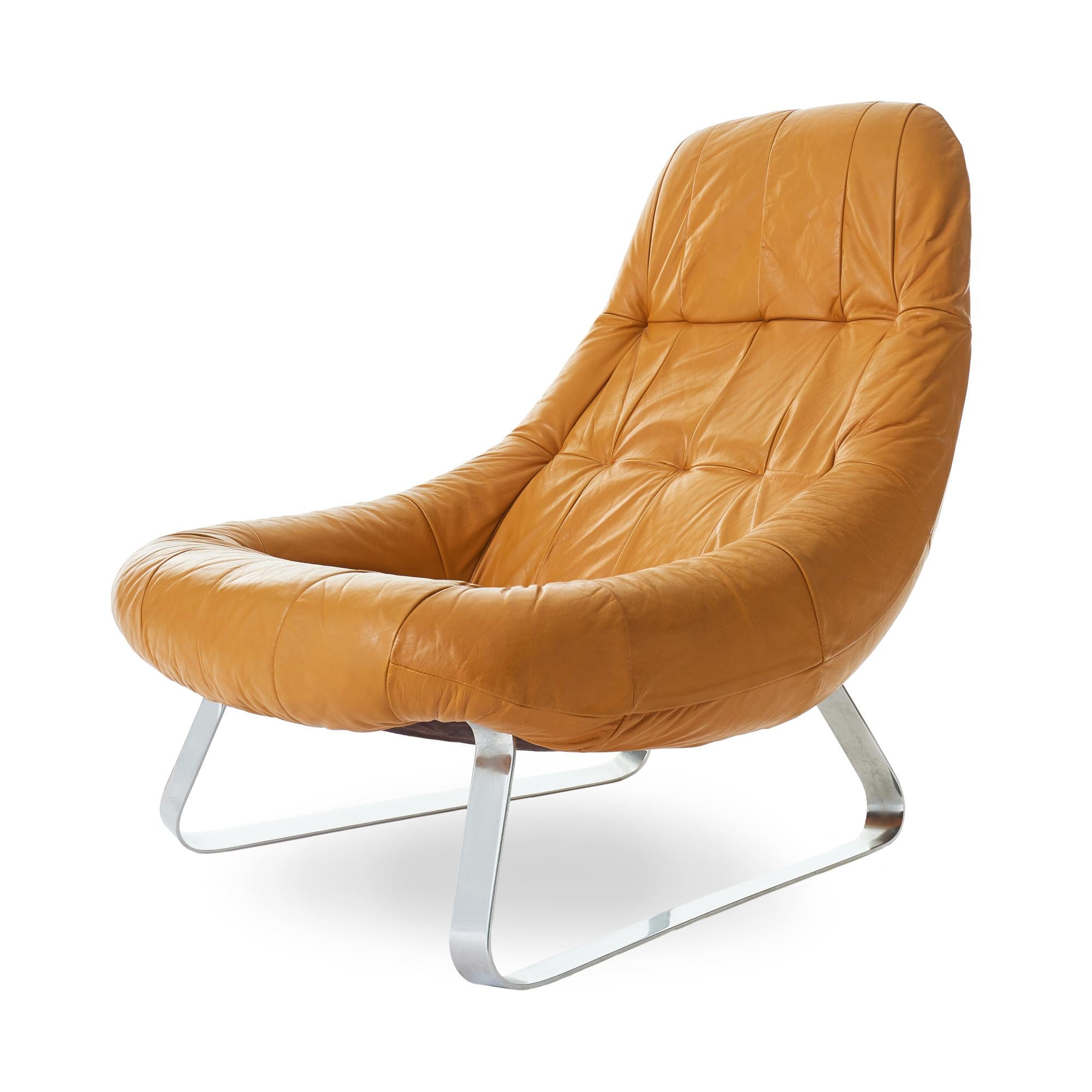 Gorgeous 1970s Percival Lafer Earth (MP-163) lounge chair made in Brazil. Original, perfectly worn in leather upholstery in a caramel color, with coordinating suede panel on back. Chrome sleigh base has been re-stabilized and re-polished, and is