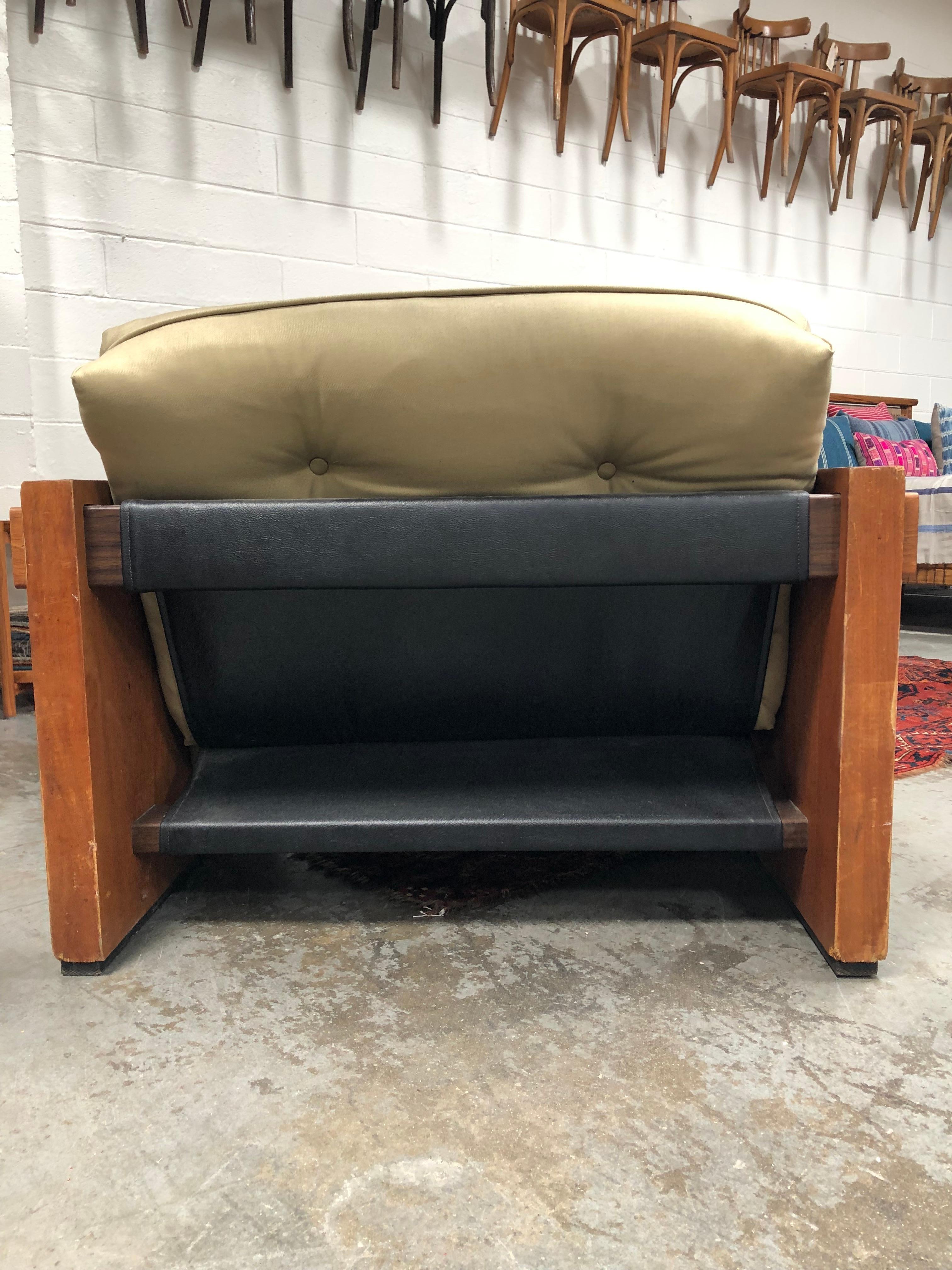 Vintage Percival Lafer inspired arm chair in durable cotton reupholstering. Tufted back and seat, with pebbled black leather strapping and wooden support notches. Sits wide and low, with plenty of space for curling up.