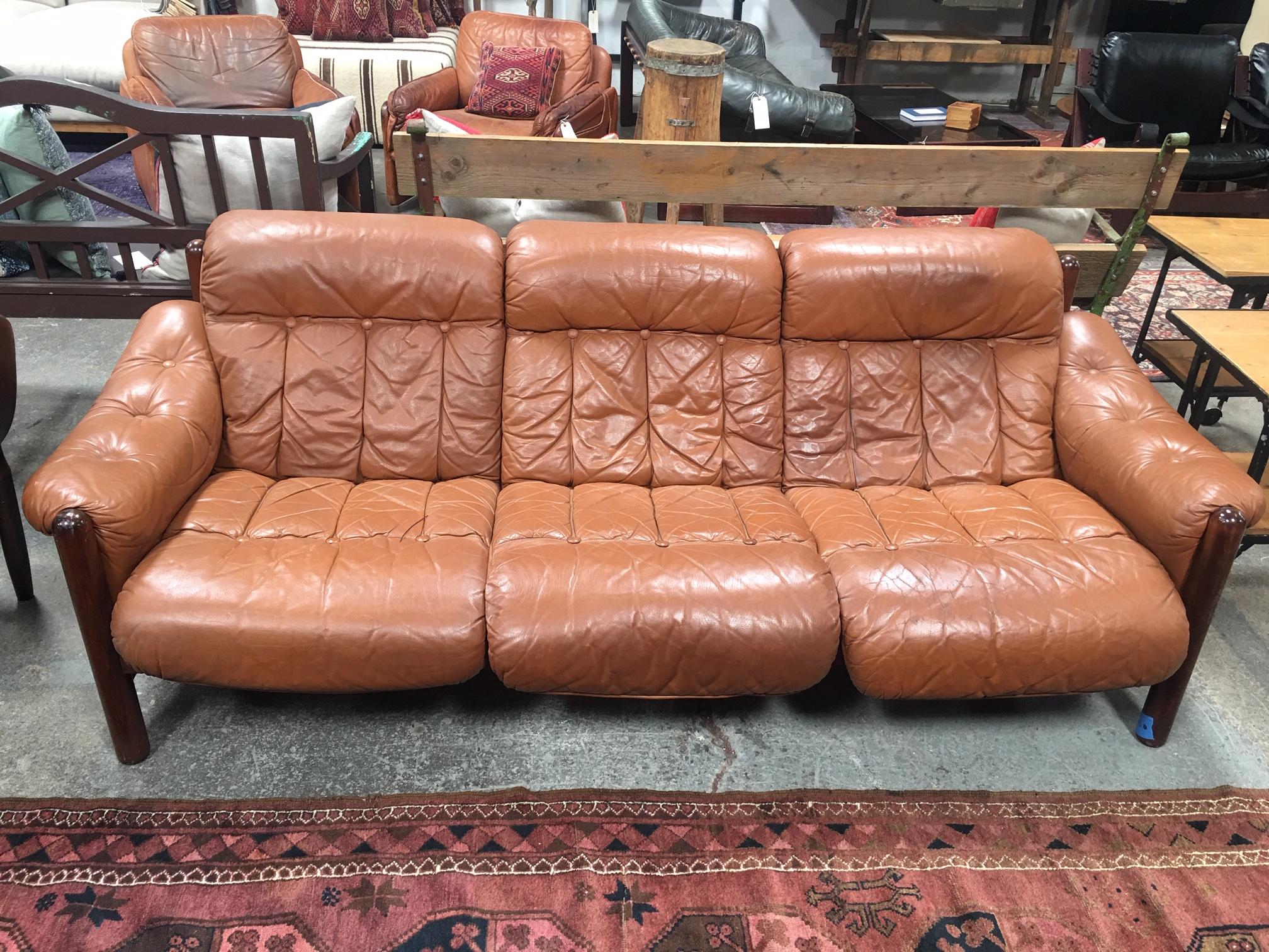 Vintage Percival Lafer sofa in a tufted cognac leather.