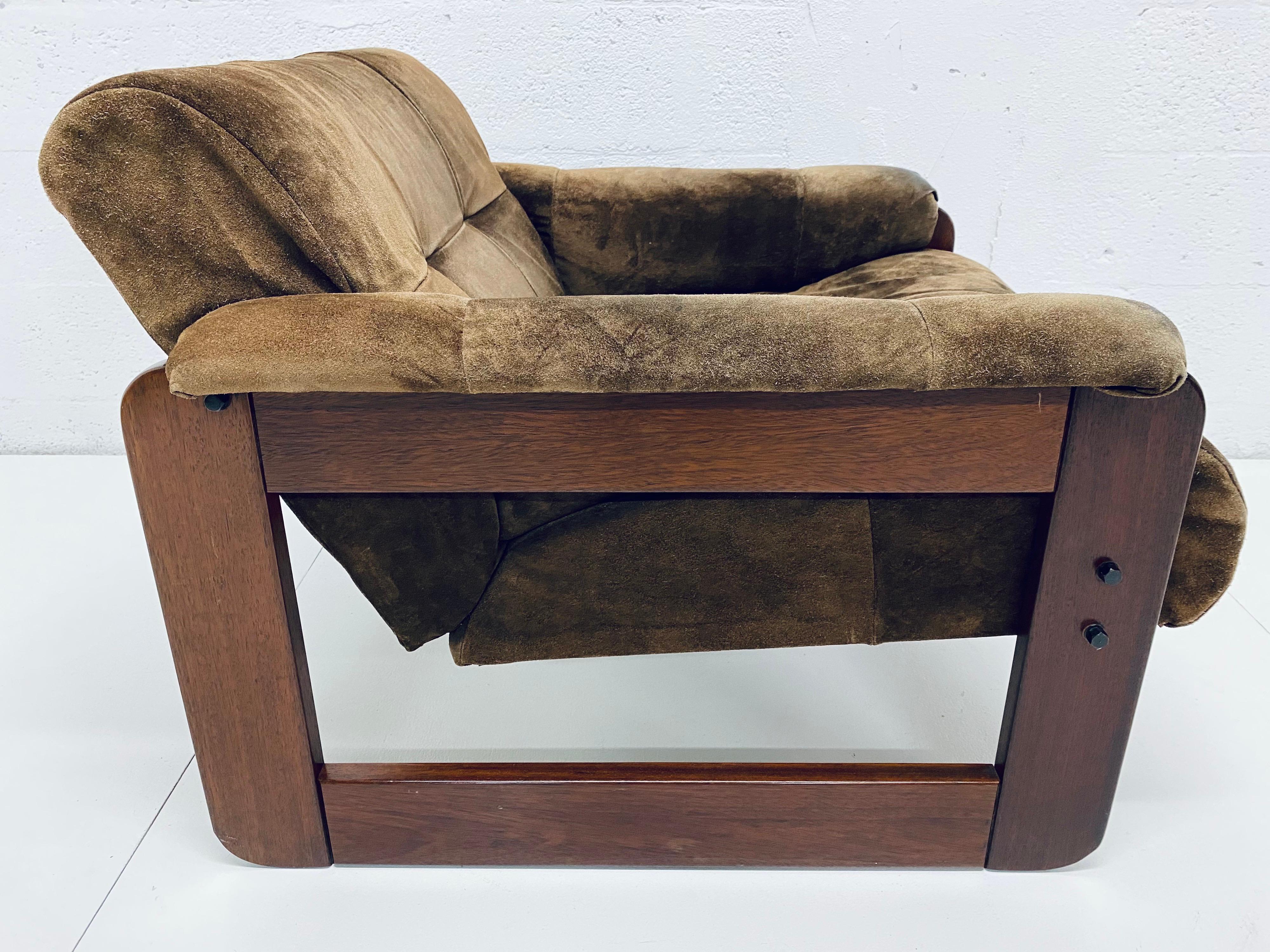 Brown patchwork suede leather over a rosewood frame lounge chair with arms by Percival Lafer, Brazil, 1970s.