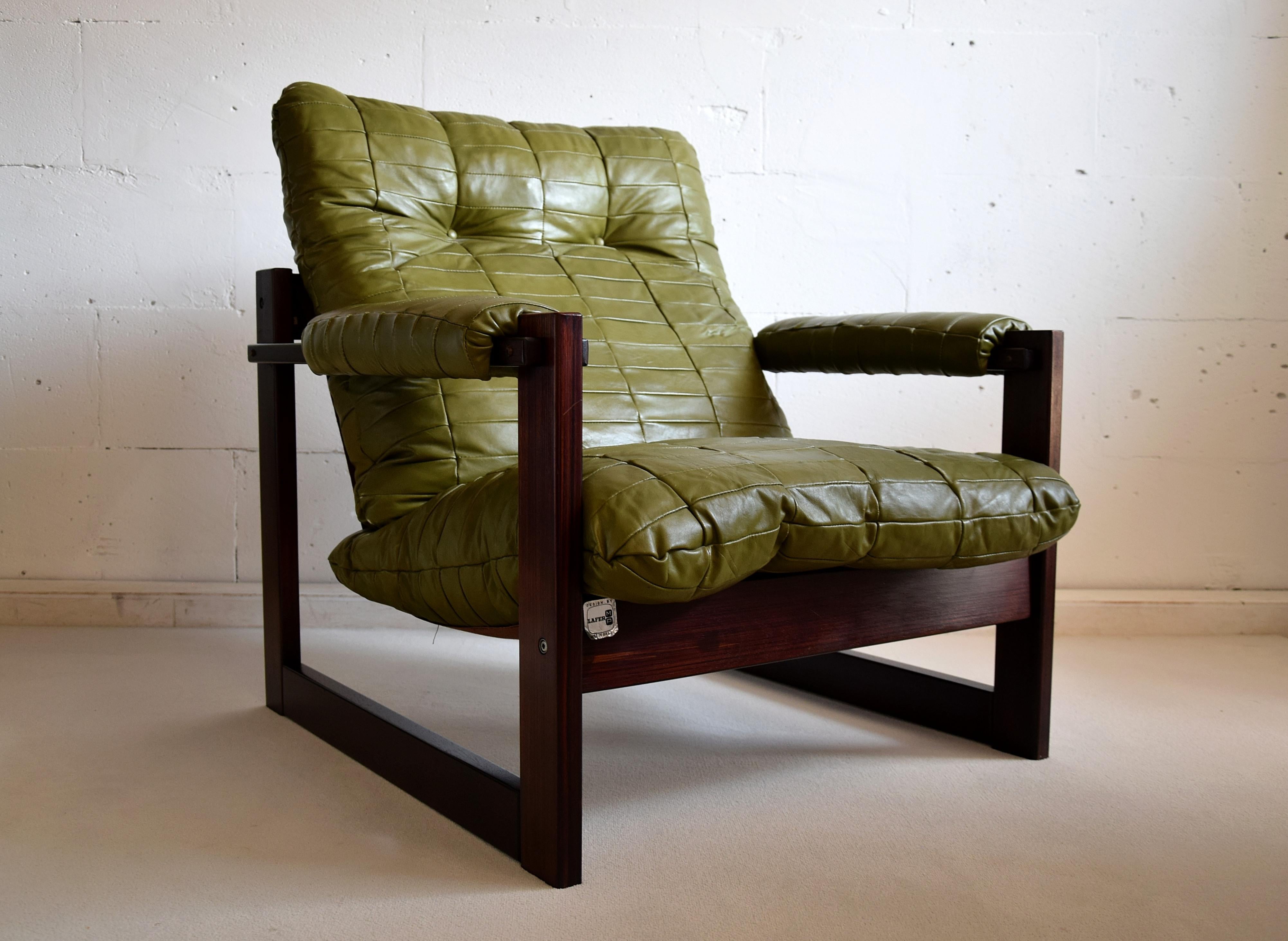 Stylish olive green Mid-Century Modern lounge chair designed and produced by Percival Lafer in Sào Paulo Brazil. The Brazilian mahogany structure is in good condition and the chair still has its original Olive green leather upholstery. This chair