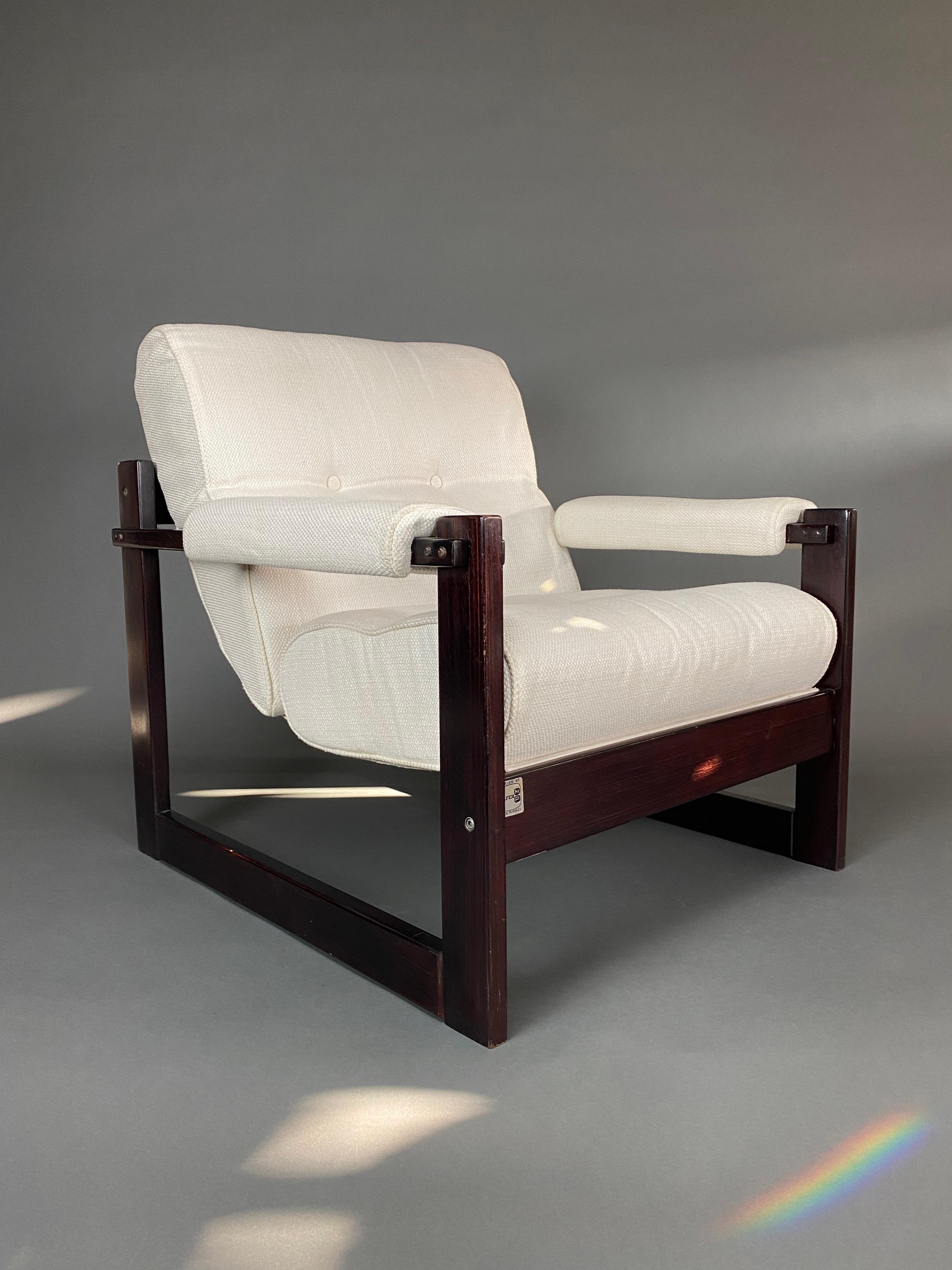 Gorgeous Mid-Century Modern pair of white upholstery and Brazilian Jatoba wood lounge chairs made in São Paulo by Percival Lafer. Both very comfortable chairs are in great condition as can be seen in the images.
This beauty will be shipped insured
