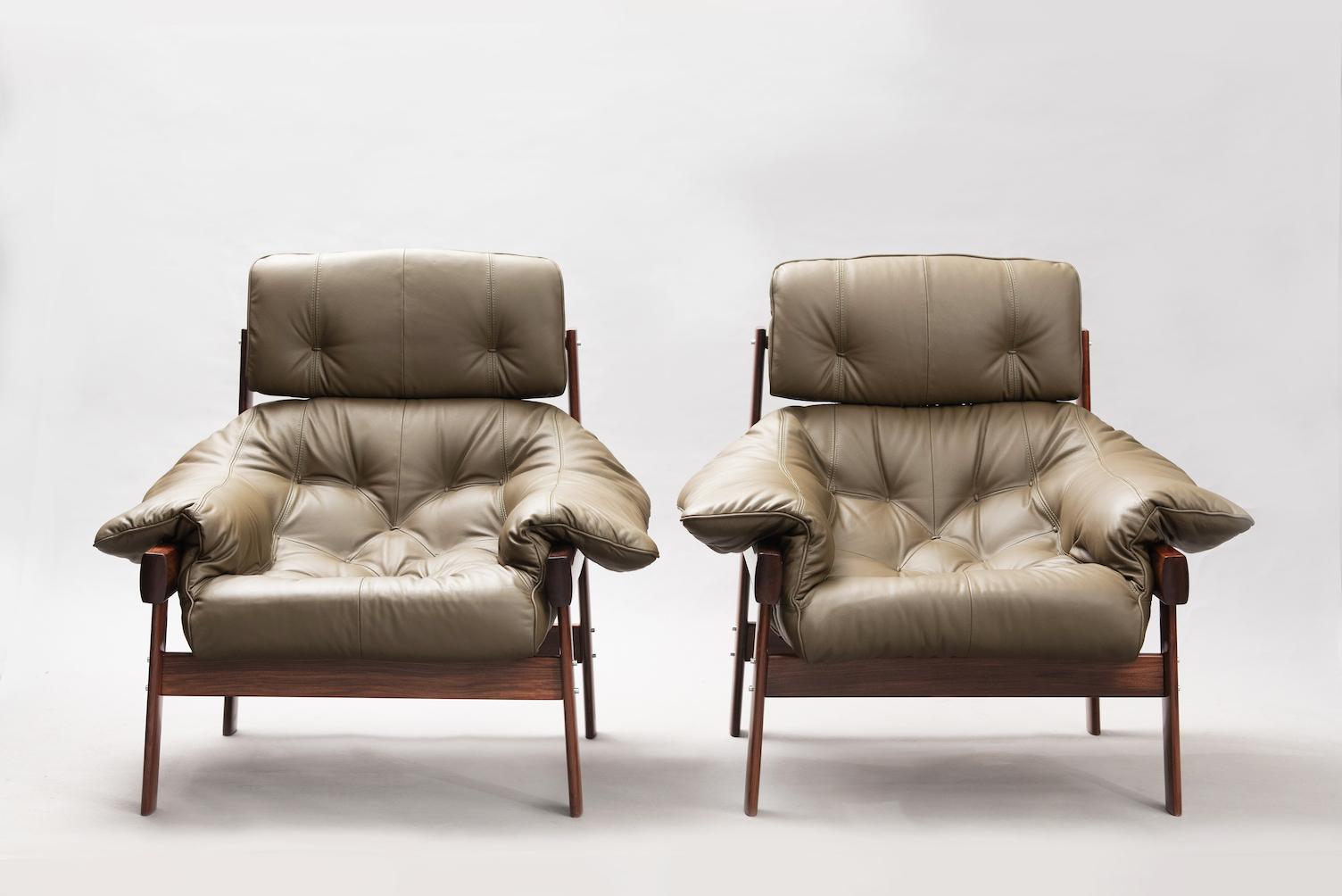Pair of hardwood Percival Lafer high back lounge chairs reupholstered in olive green leather.
Note: Missing in the photos the leather straps for one chair and the wood pins, but they are already totally completed.