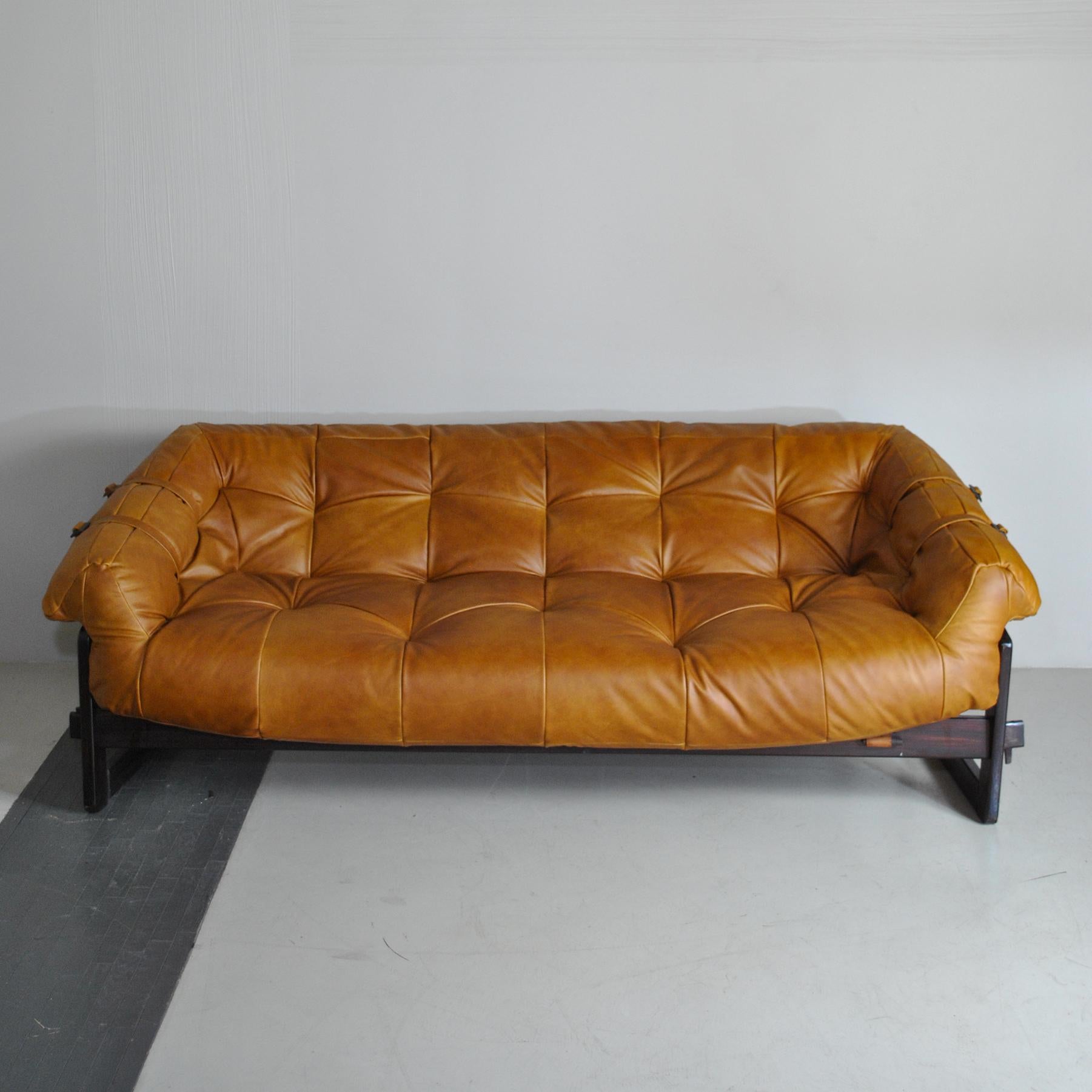 Sofa by Percival Lafer. Brazilian design and original leather. Really unique design and construction make this a true statement piece.
  