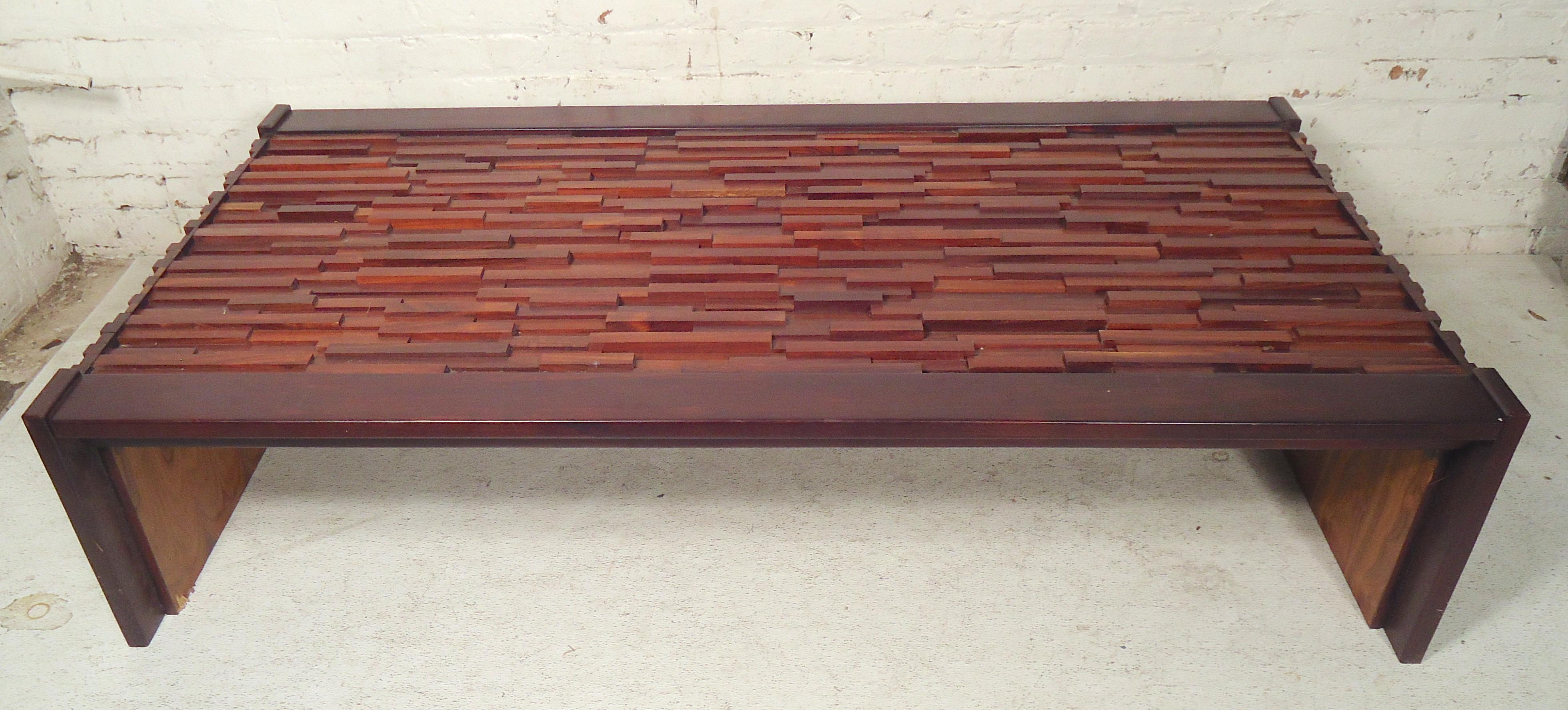 Mid-Century Modern coffee table with brutalist style. Features a sculptural relief design throughout.
(Please confirm item location - NY or NJ - with dealer).
 