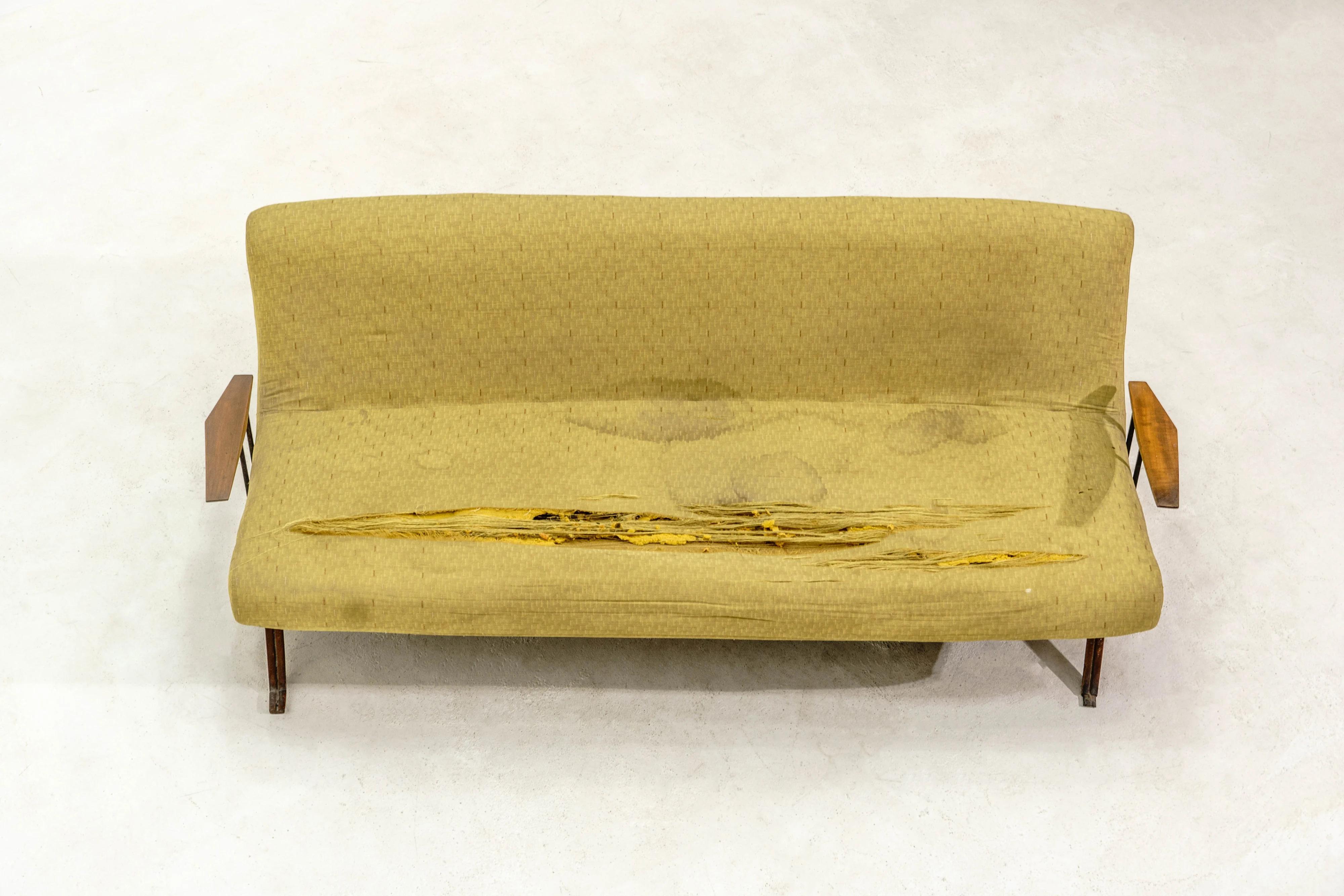 The MP-01 sofa is a super, super rare classic piece of Brazilian mid-century modern design, created by renowned architect and designer Percival Lafer in 1961. Known for its distinctive T-shaped base and elegant lines. The sofa typically features a