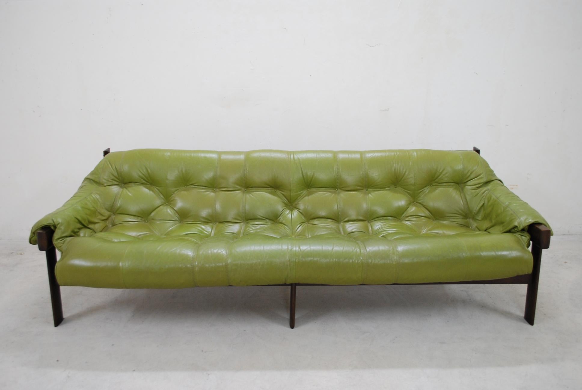 This leather sofa were designed by Percival Lafer in Brazil in 1961. Manufacture is Lafer furniture.
They feature wooden frames in Pau Ferro wood with lime green leather upholstery, which has become beautifully patinated over time.
This version is
