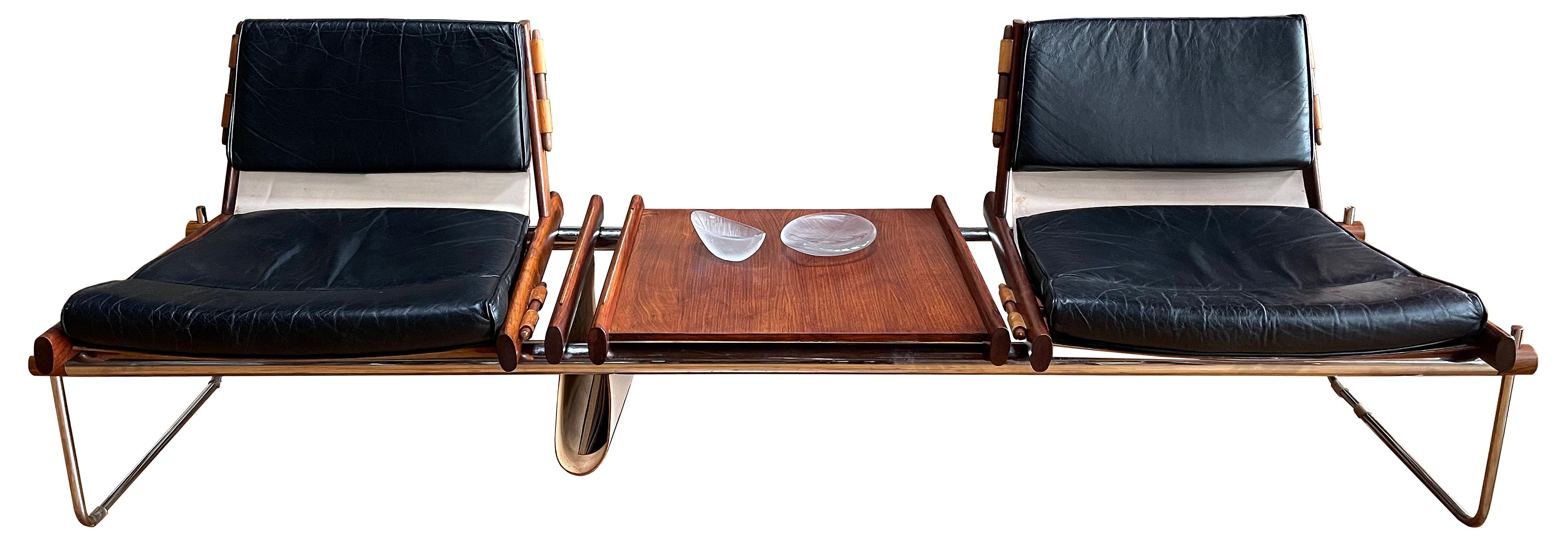 One of Percival Lafer's most desirable pieces. 

A MP-123 Modular seating unit. This example in brazilian rosewood with original leather and polished stainless steel . 

Seating elements and table/magazine rack are modular and can be configured