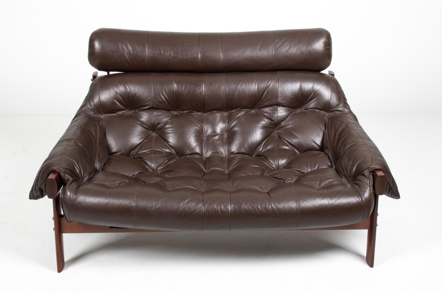 Exotic and luxurious, this stunning seating suite by Percival Lafer features frames of solid Brazilian Pau Ferro wood and slung cushions finished in the finest chocolate brown leather. All three pieces are from the iconic MP-41 series and feature