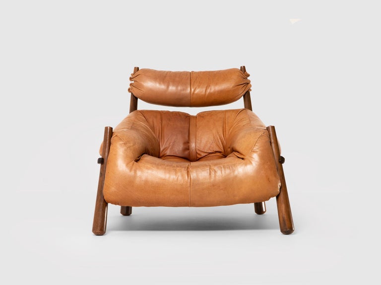 Brazilian rosewood lounge chair by Percival Lafer, 1960s.
Solid rosewood legs, original hand-tufted leather seat. 
Minor traces of use and age.