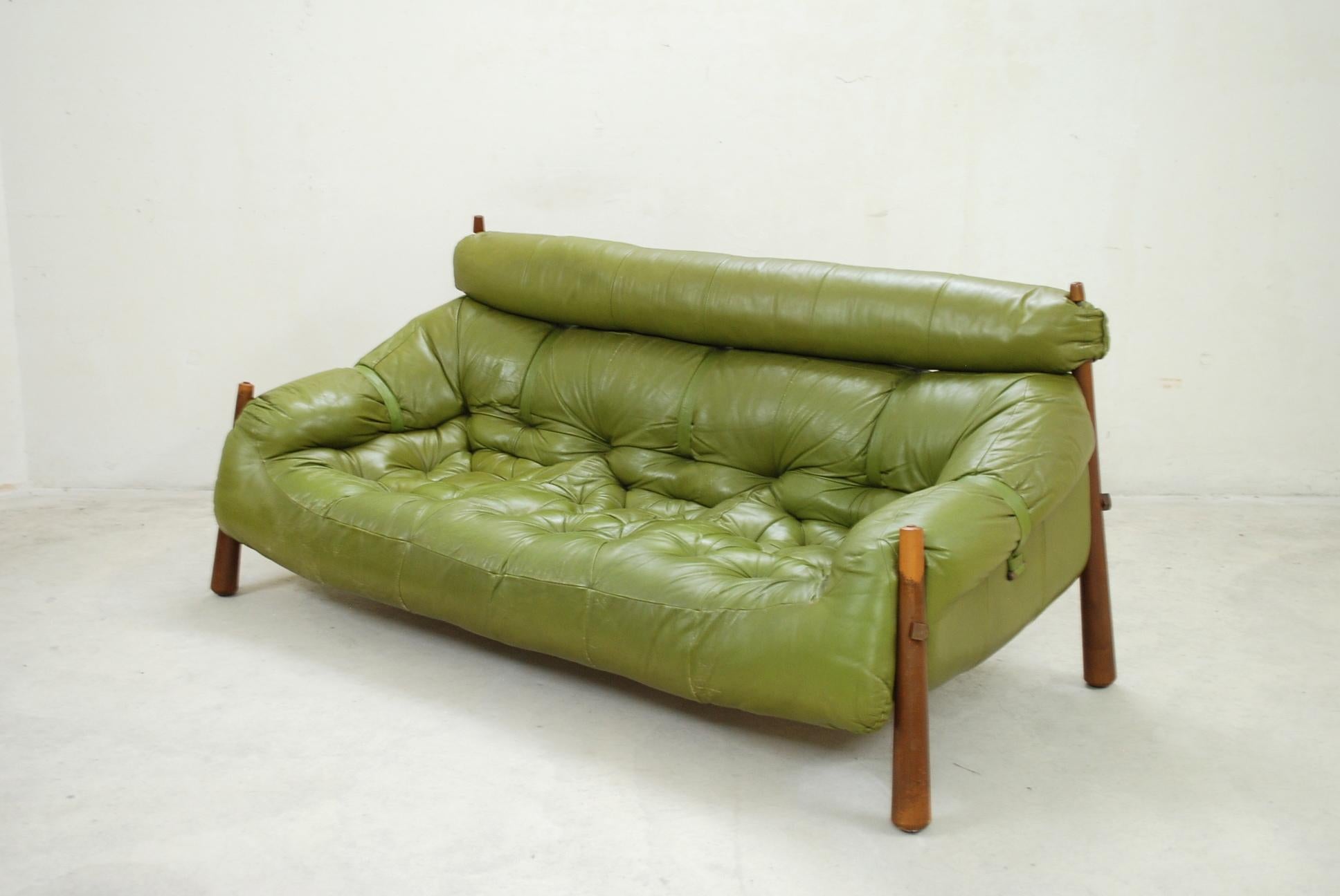 This leather sofa model MP 81 were designed by Percival Lafer in Brazil in 1972.
Manufacture is his own company Lafer furniture.
They feature wooden frames with lime green leather upholstery.
The wood color is changing and gets a beautiful