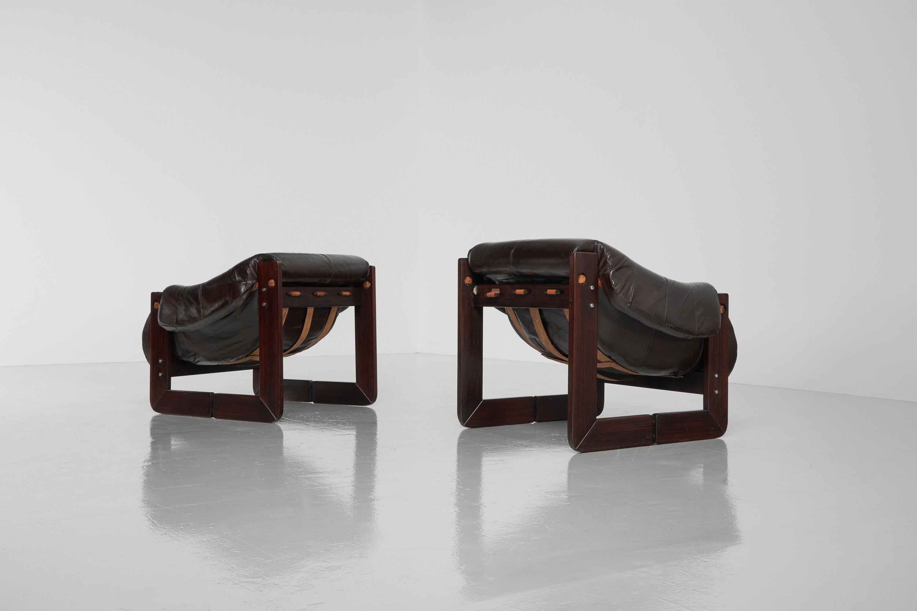 Very nice sculptural pair of MP97 lounge chairs designed and manufactured by MP Lafer, Brazil 1970. Percival Lafer was one of the leading furniture design manufacturers in Brazil who managed to produce furniture on a large, industrial scale. This