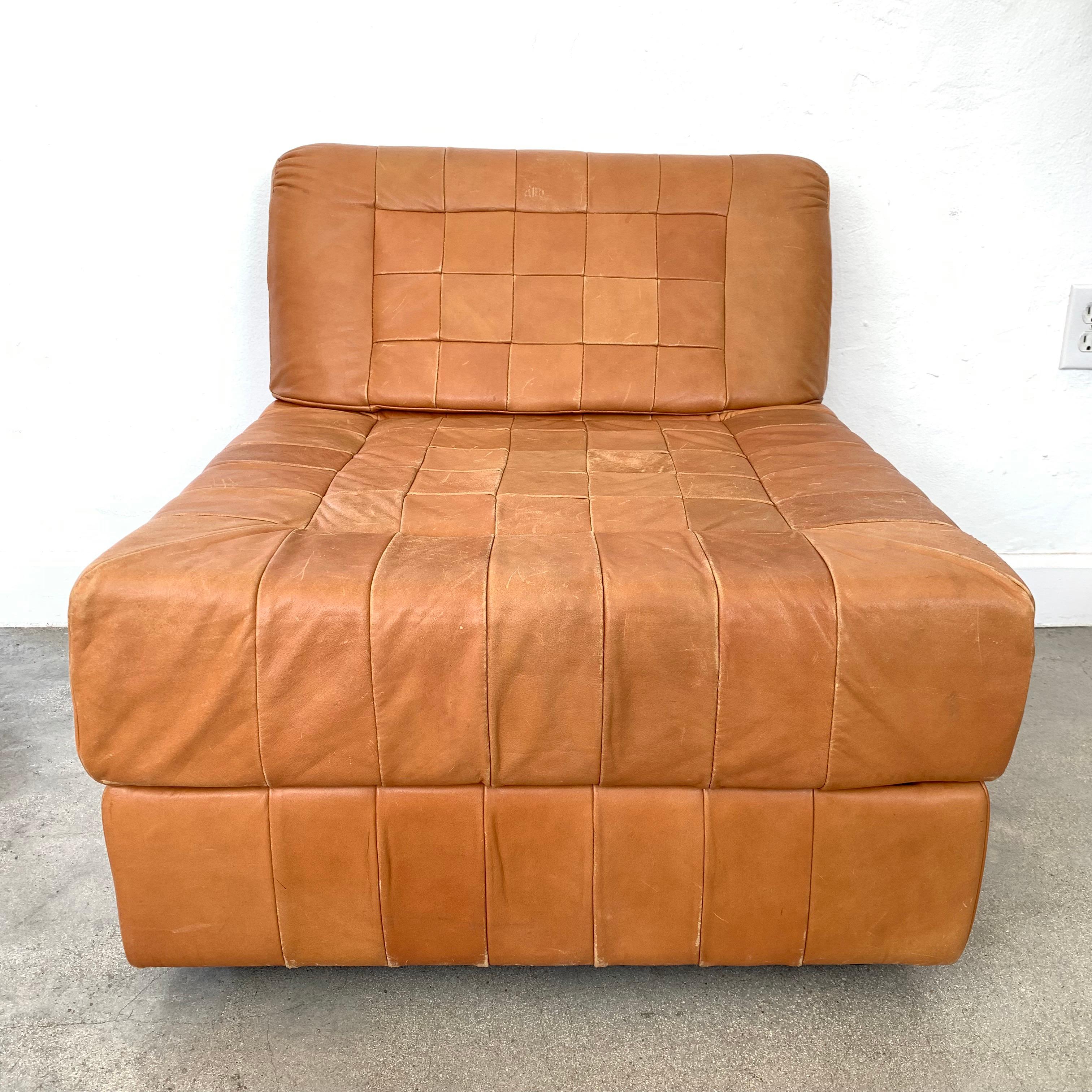 Patchwork leather chair with removable back rest also can be used as an ottoman designed by Percival Lafer, for Brazil Industries.