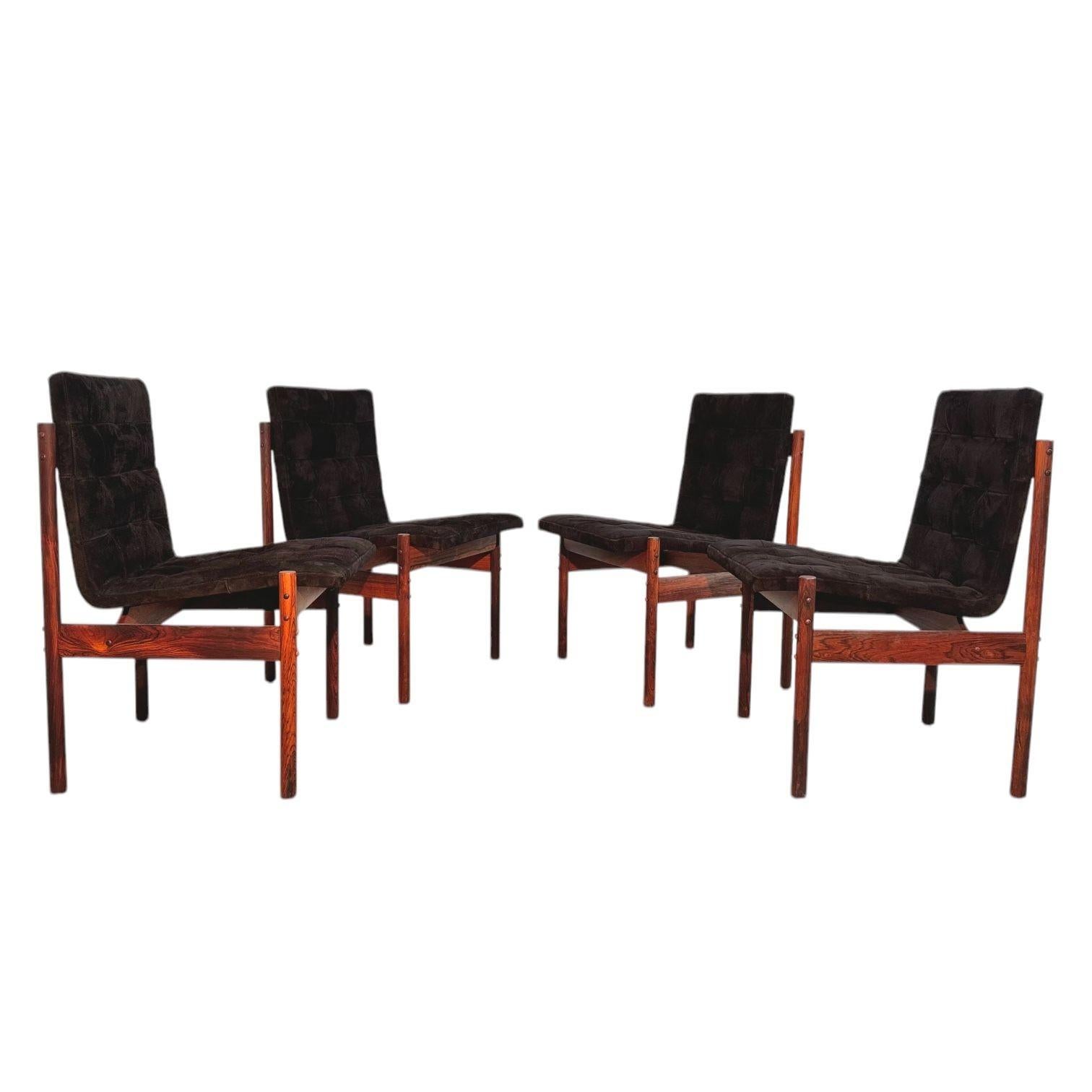 Percival Lafer Rosewood & Black Suede Dining Chairs, set of 4, Brazil. Chairs have been restored and newly upholstered in black suede.
Measure 21” wide 22” deep 31.5” tall seat height 18” seat depth 17.5”