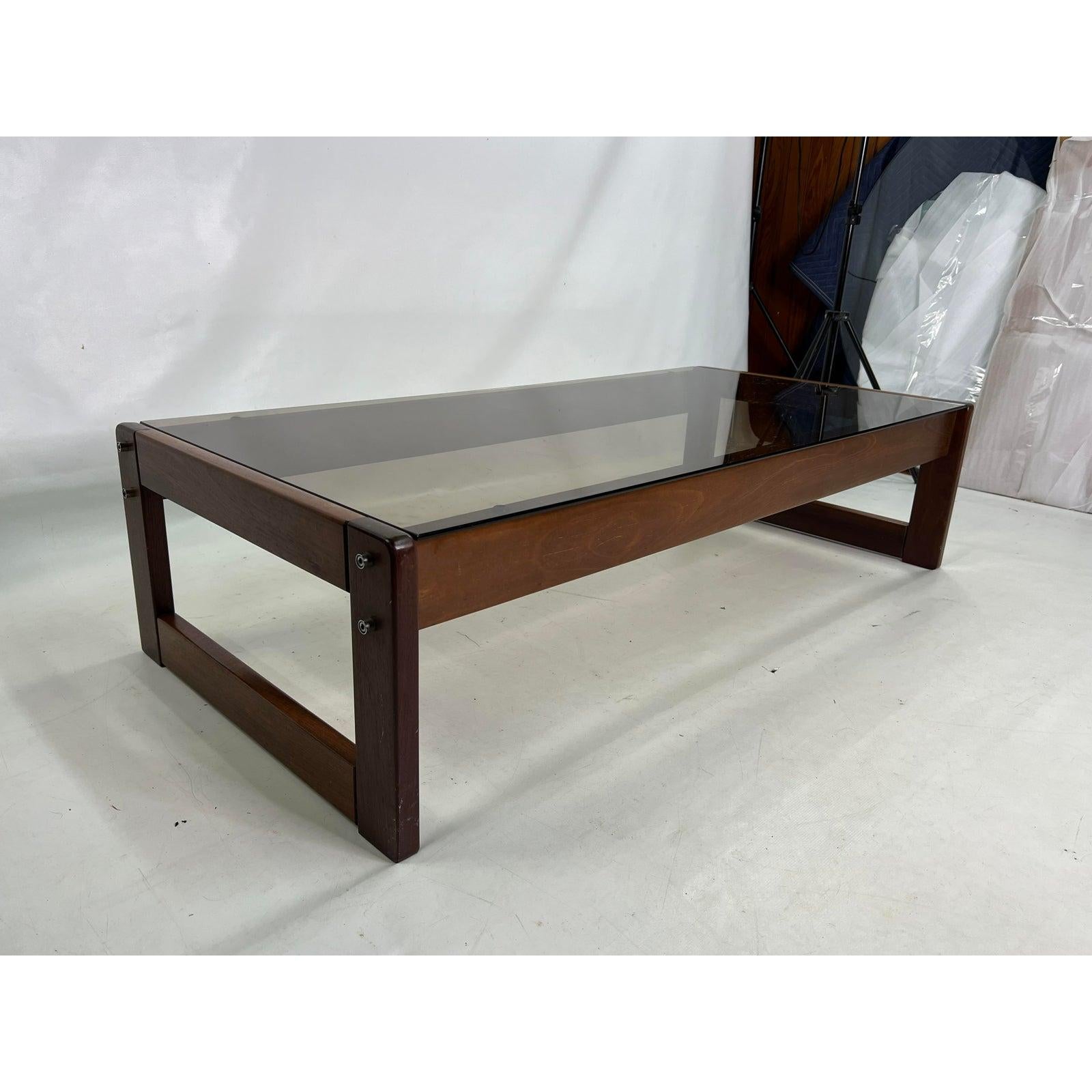 Percival Lafer rosewood coffee table with smoked glass.