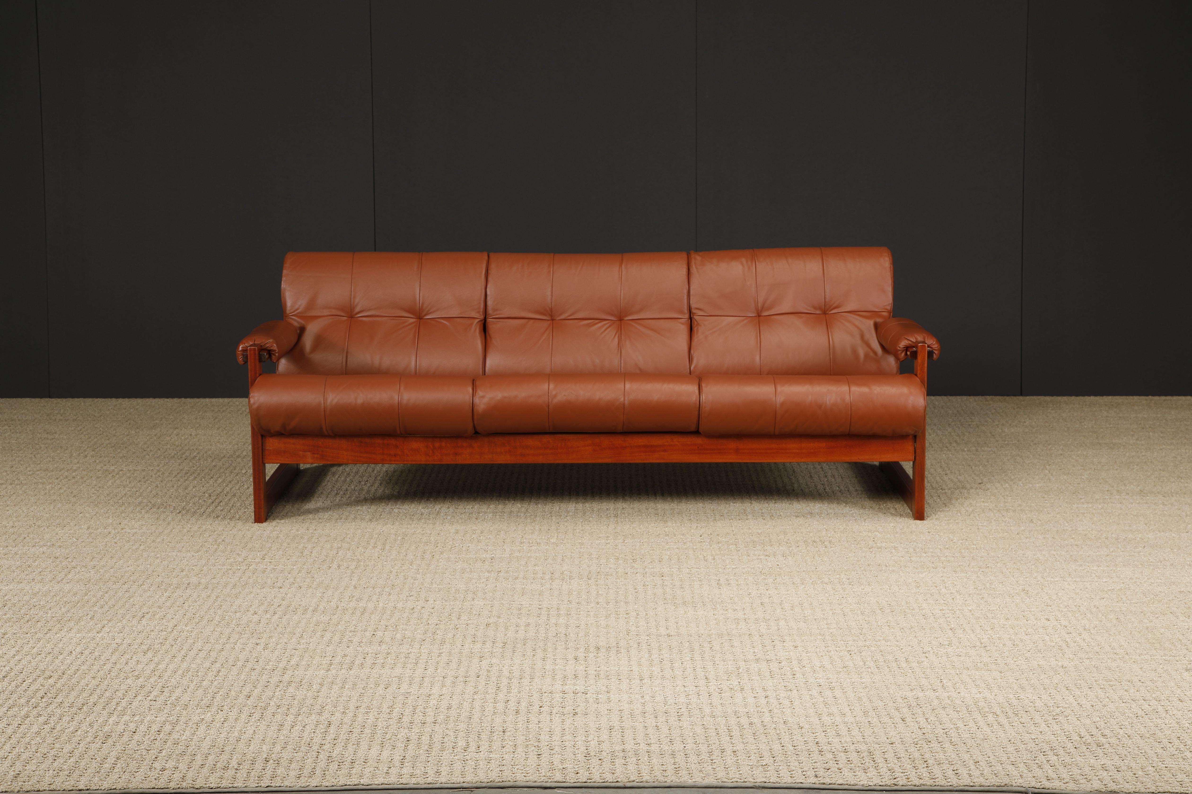 This gorgeous restored 'S-1' sofa by Brazilian designer Percival Lafer for Lafer MP. This sofa was designed in 1976 and was Lafer's concept of merging Brazilian design with Scandinavian sensibility - the sling seat cushions are made of molded foam