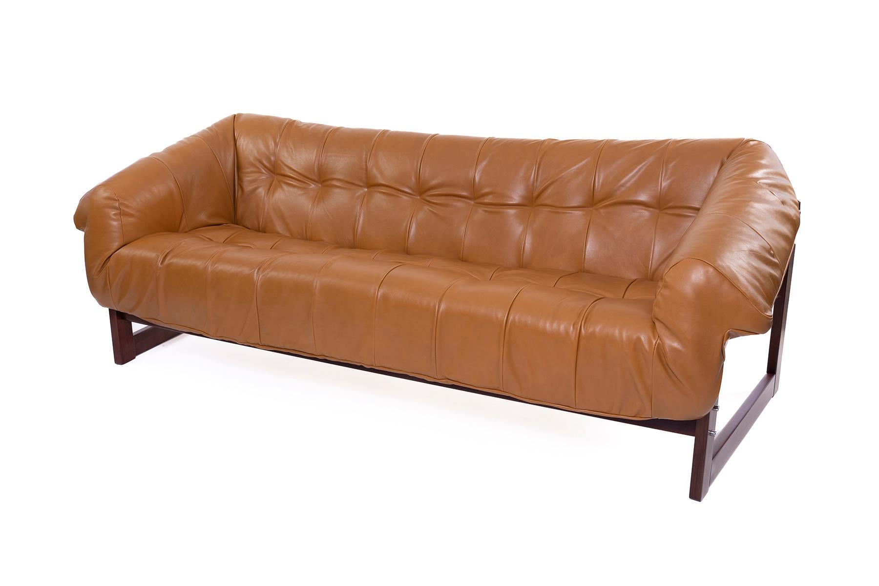 Brazilian Percival Lafer 1970s sling sofa newly upholstered in Maharam cognac leather. Rosewood frasme has been newly finished. Sits extremely comfortably!
