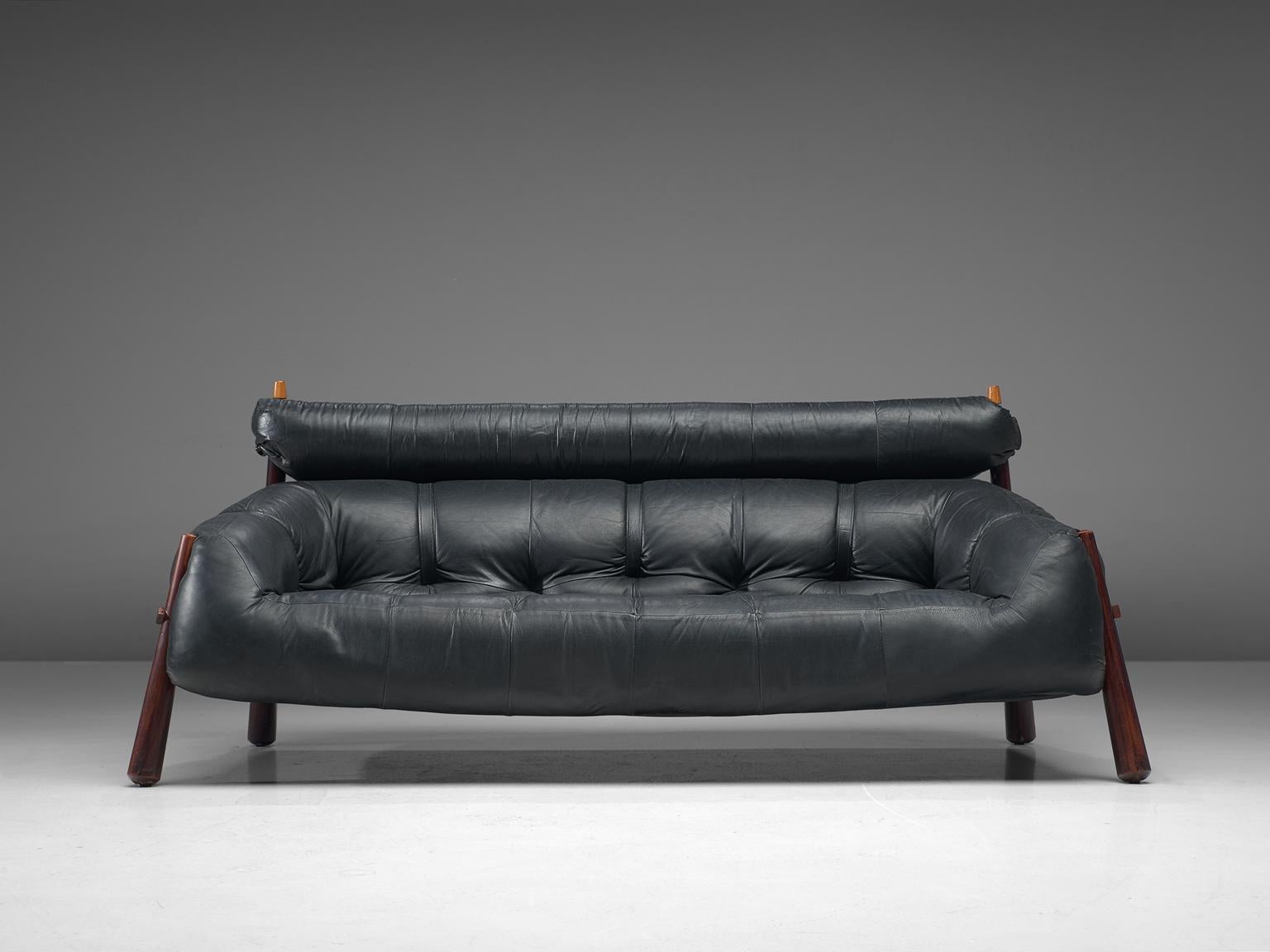 Percival Lafer, sofa model MP-81, in rosewood and leather, Brazil, 1972.

Beautiful sofa by Brazilian designer Percival Lafer. This sofa consists of a solid dark wooden base to which the leather seating is attached. The tufted black leather