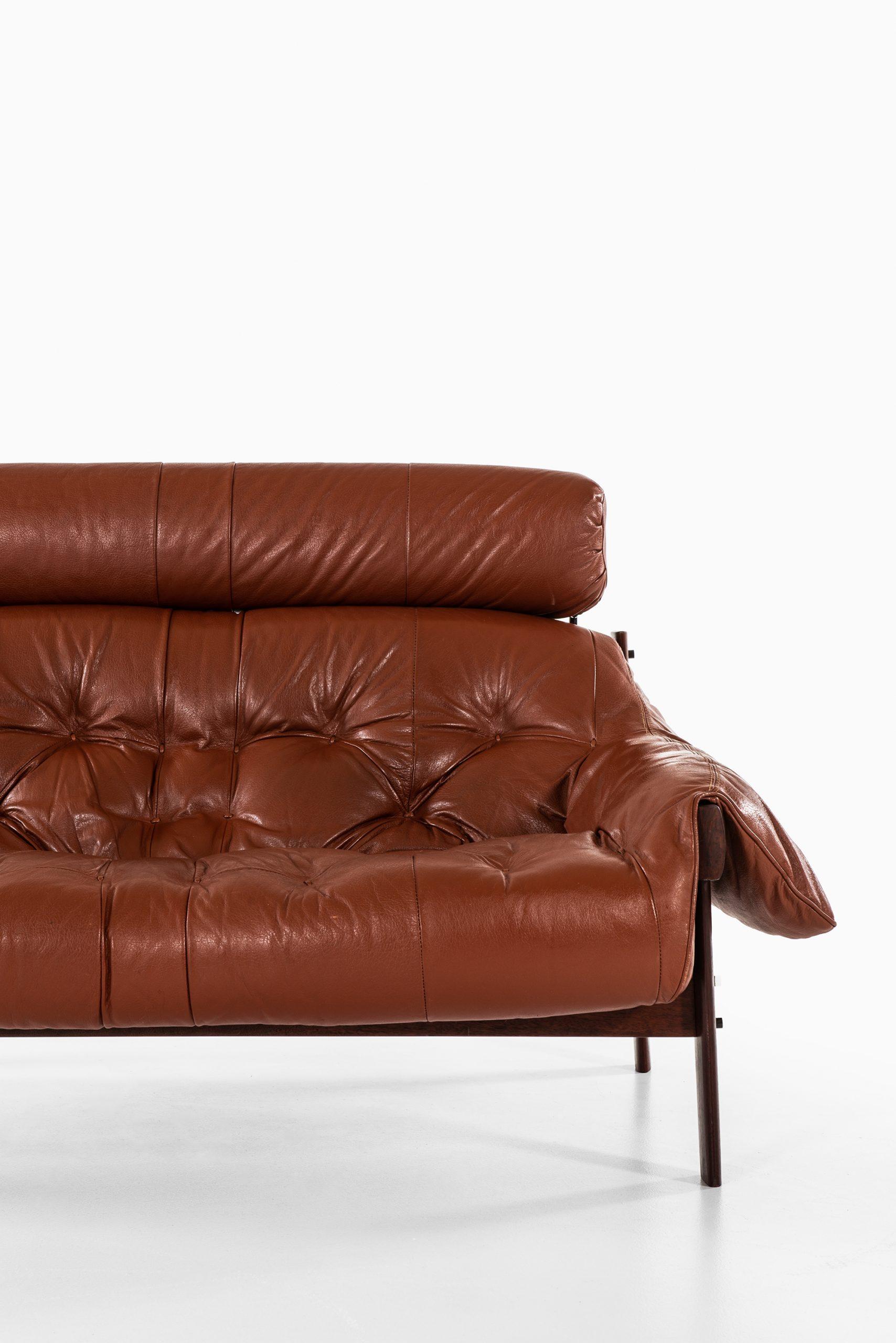 Rare 2-seat sofa designed by Percival Lafer. Produced by Lafer MP in Brazil.