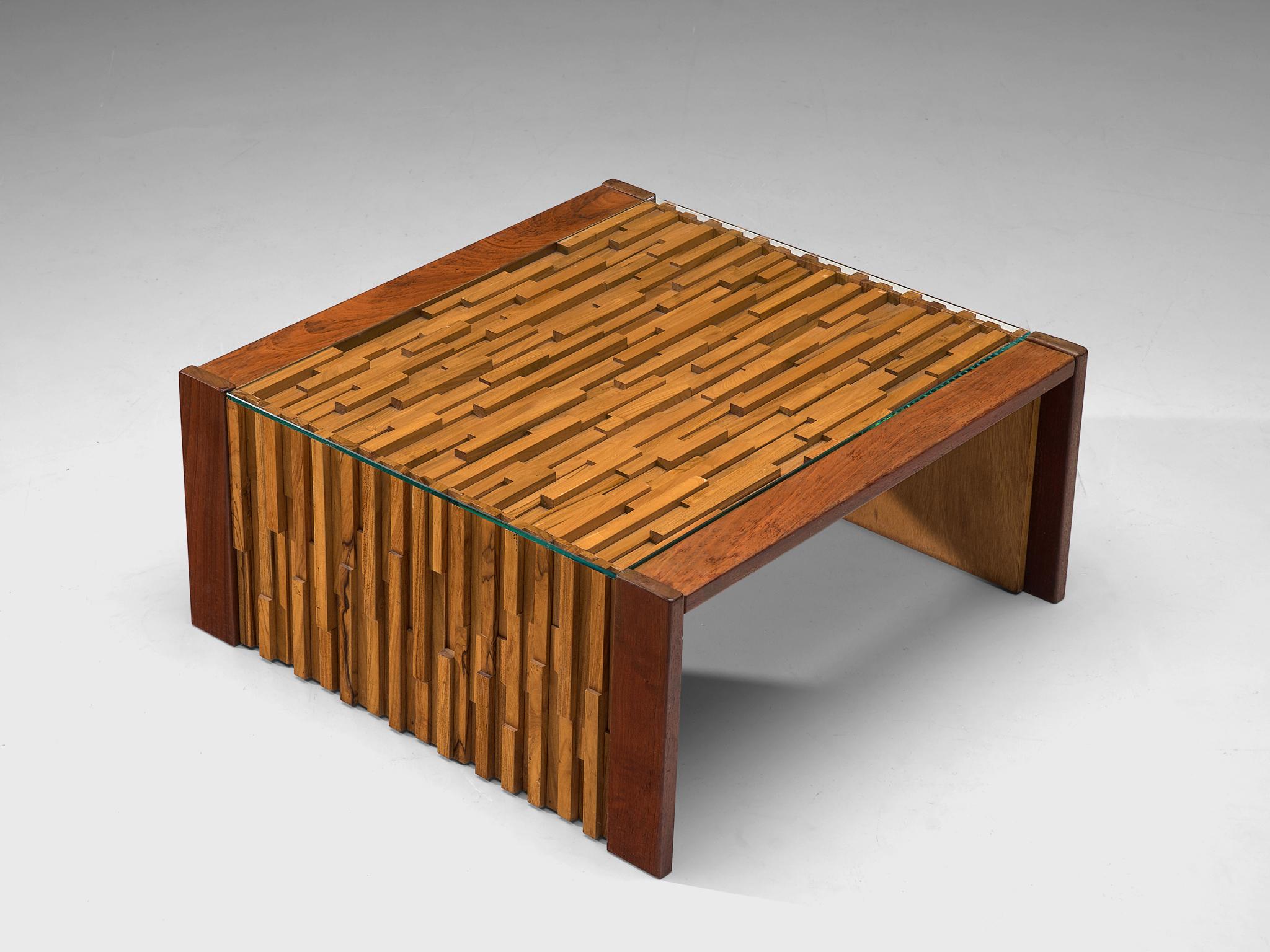 Percival Lafer, coffee table, wood, mahogany, glass, Brazil, 1970s

Amazing cocktail table by Brazilian designer Percival Lafer. Highly sculptural design that is build up with pieces of wood and mahogany. All the pieces have different dimensions,