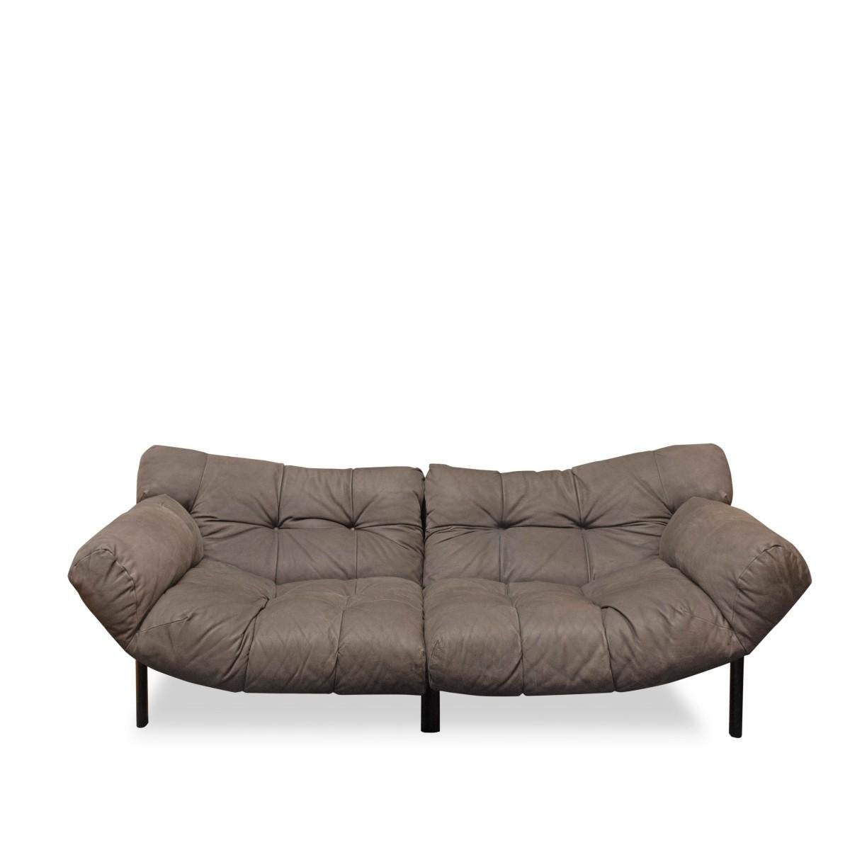 A Percival Lafer style pillow top sofa and coordinating chair in distressed grey leather on a black wood frame.

Includes one sofa and one chair.

Dimensions:
Chair: 42