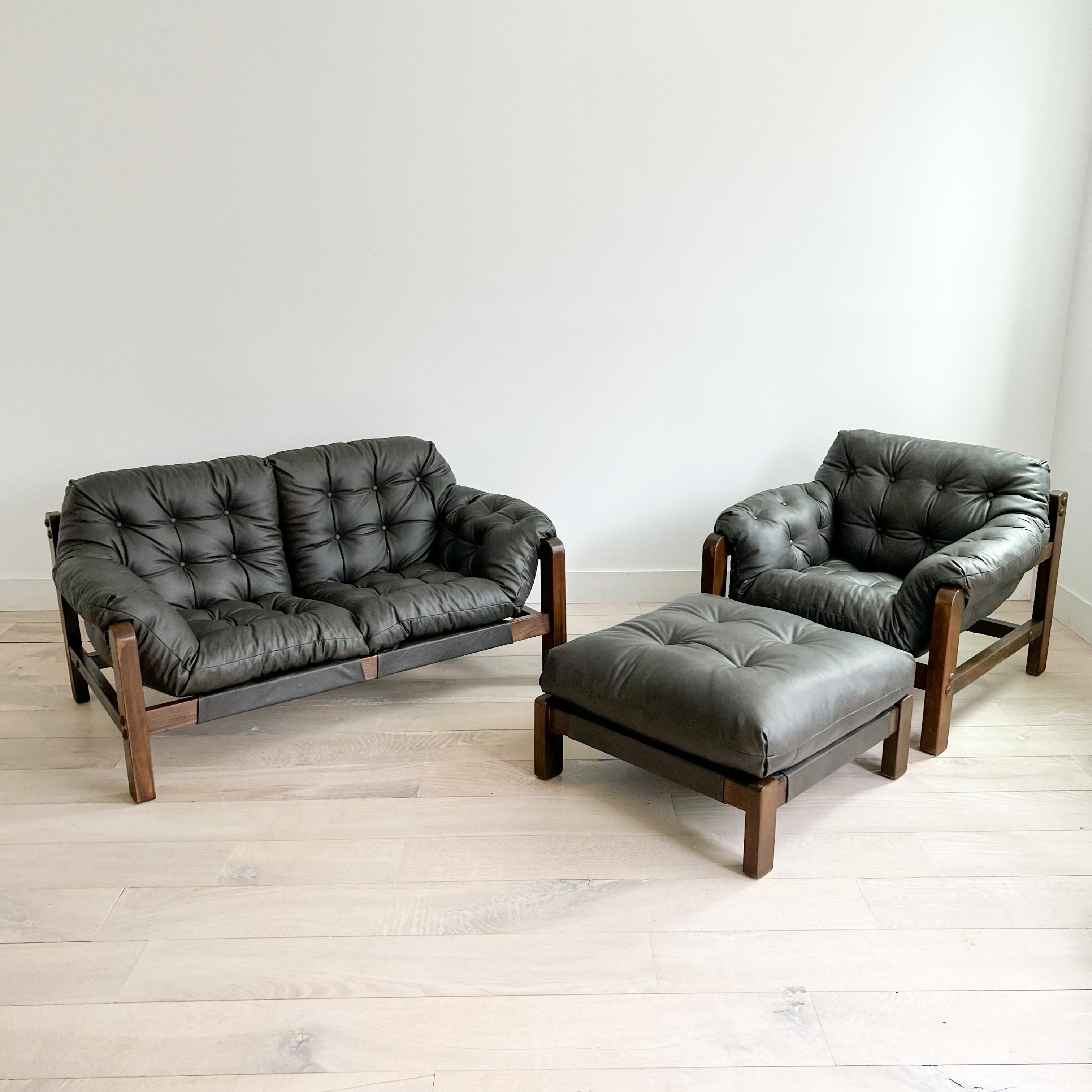 Mid-Century Modern sofa loveseat, lounge chair and ottoman set. New tufted brown leather upholstery! Super comfortable set. Some light scuffing/scratching to the wooden frames from age appropriate wear.

Measures: Chair - 37”x35” 16”SH