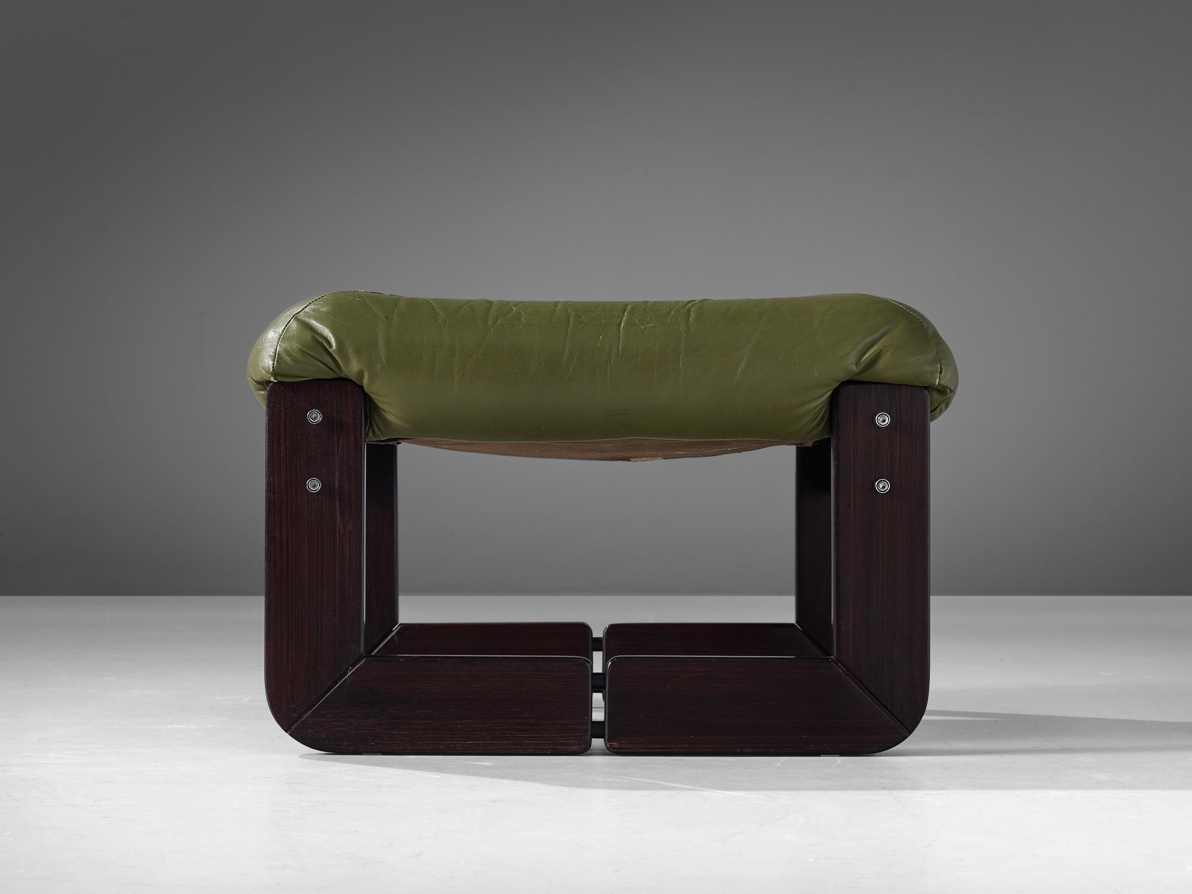 Percival Lafer, ottoman, brazilian hardwood, leather, Brazil, 1970s

Bulky and voluptuous pouf made in the 1970s by Percival Lafer. The green leather of the seat is tufted, which contributes to the ottoman's sturdy appearance. The  geometric legs of