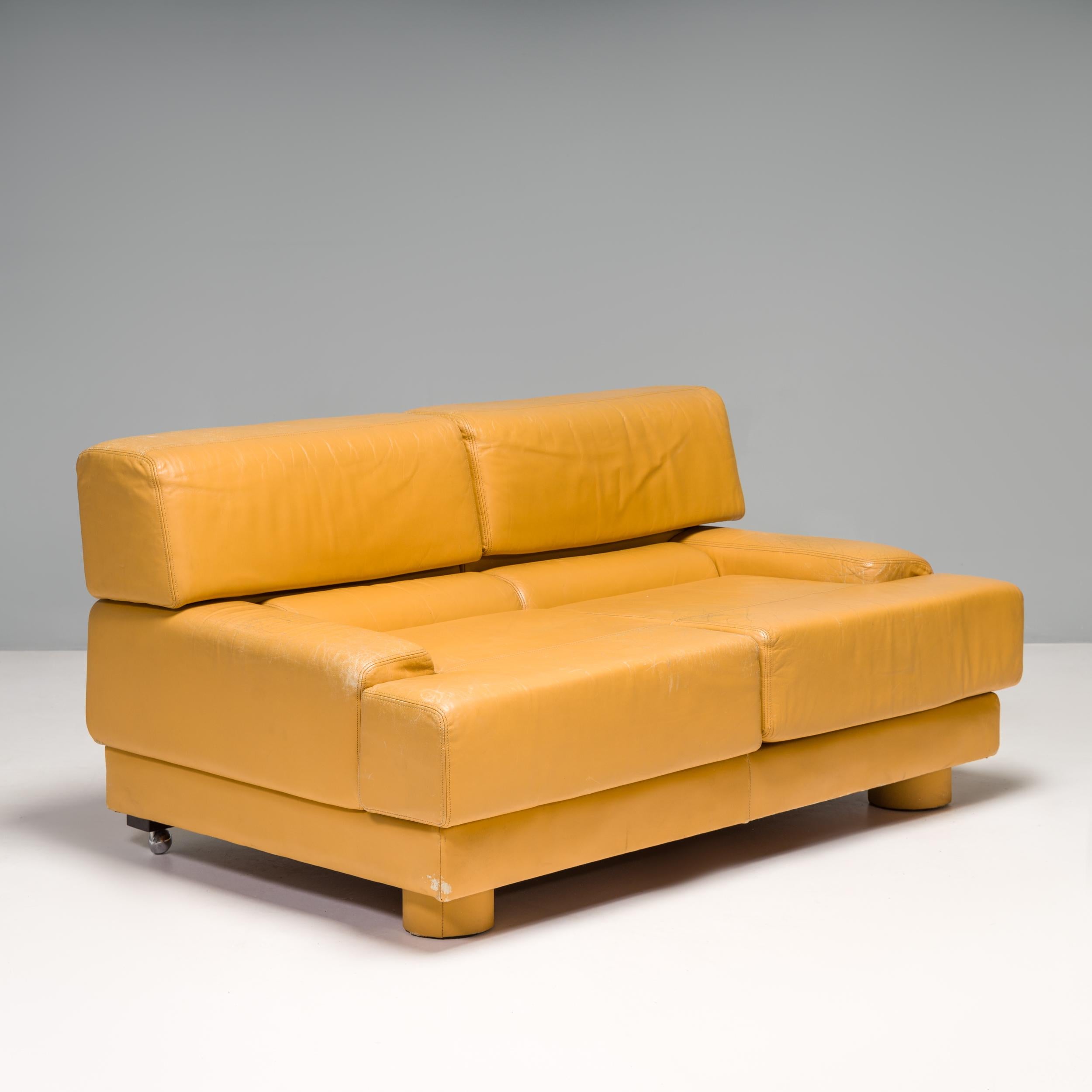 Originally designed by Percival Lafer & produced by LAFER in São Paulo, this 1960s sofa is a fantastic example of Brazilian mid-century design.

Featuring a boxy silhouette, the sofa is fully upholstered in the original yellow leather with