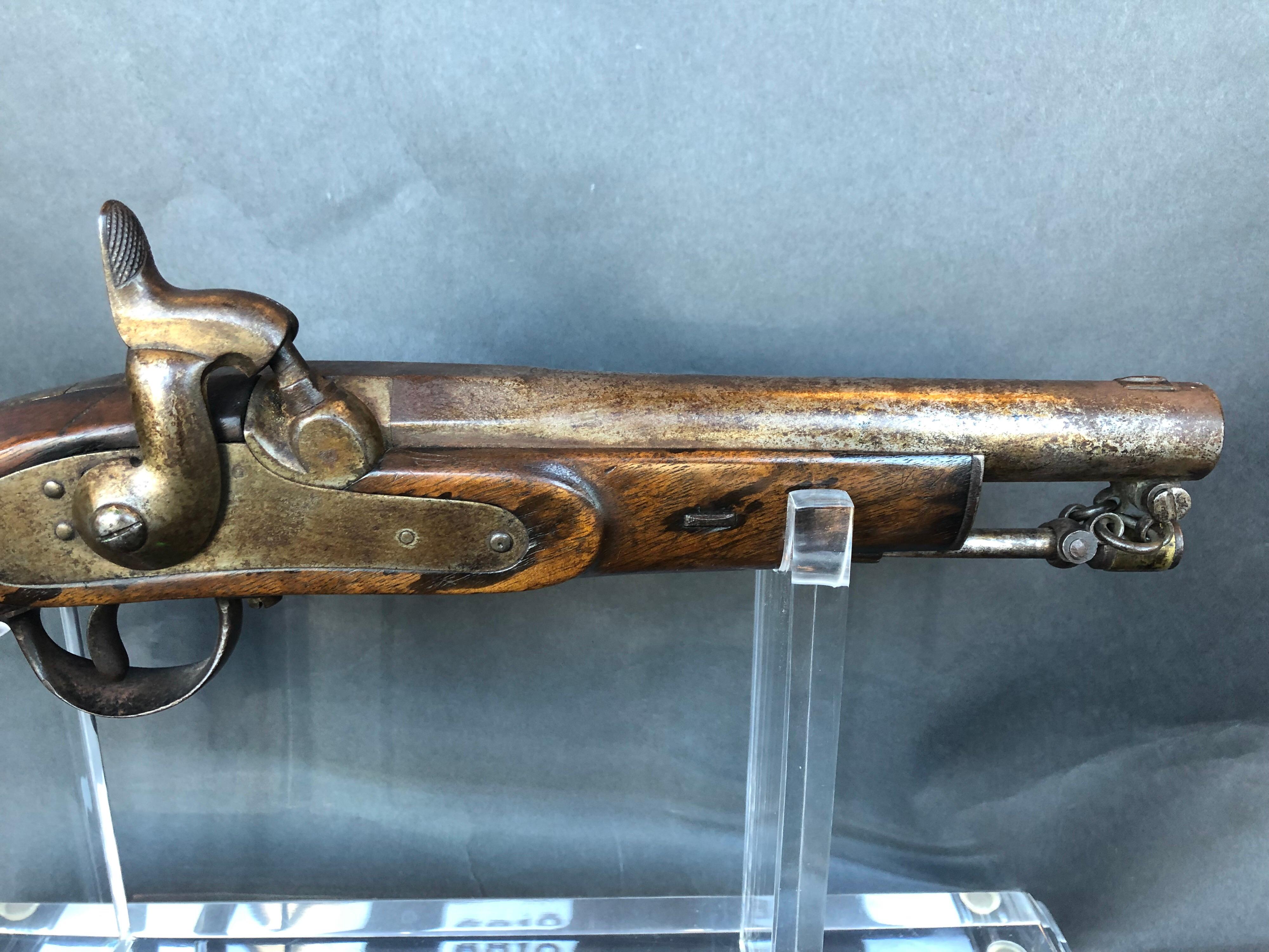 Flint lock pistol. Measures: 8.5 inches H x 14 inches W x 2.2 inches D.
