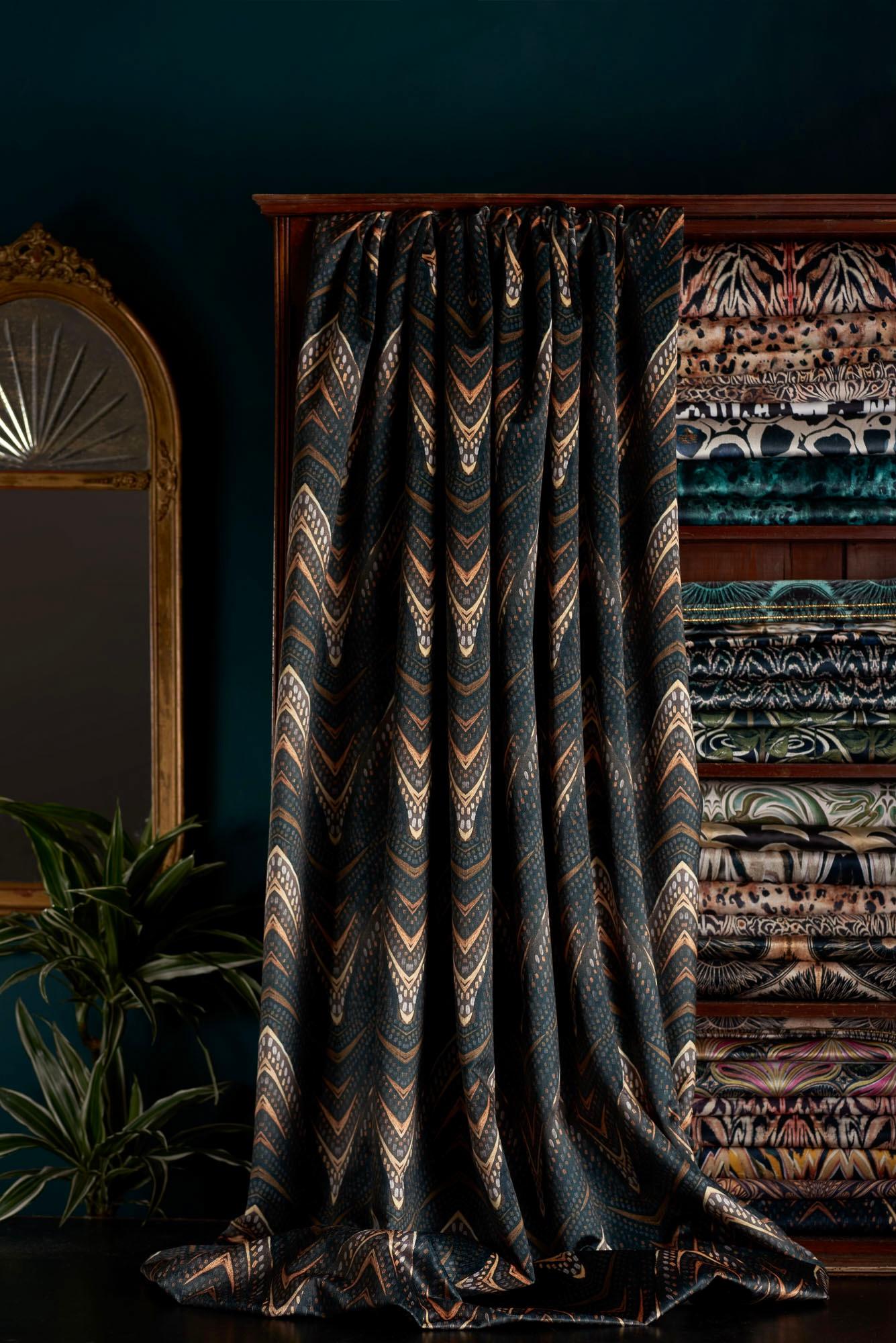 Perdita – a 1920s inspired design created from painting metallics onto black canvas. The depth has printed soft, so the background is more of a bitter chocolate/soft black colour, with grey gold and toffee accents.

This velvet is midweight, with a