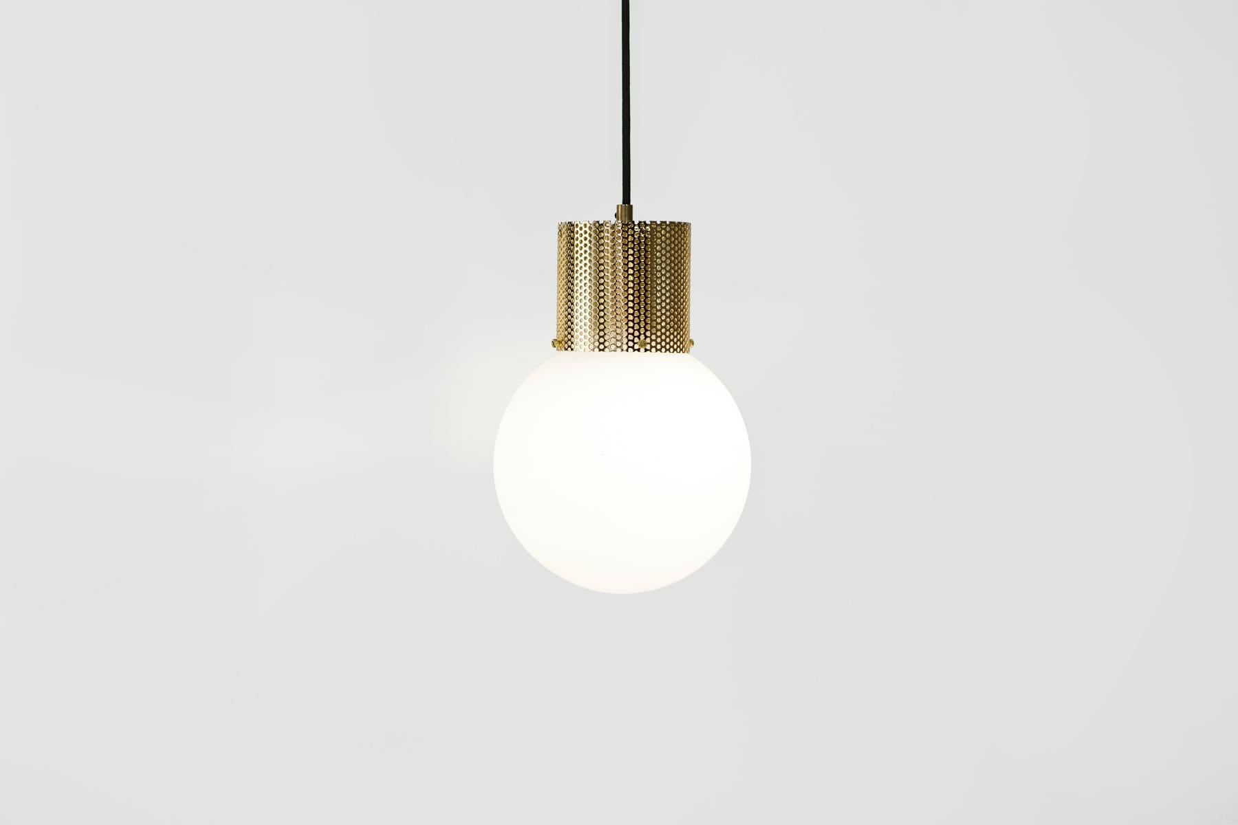 Contemporary Perf Pendant Light, Medium Off-White Perforated Tube, Glass Round Orb Shade For Sale
