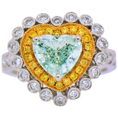 Perfect 53.23 Carat Heart Shape Natural Fancy Very Light Yellow-Green