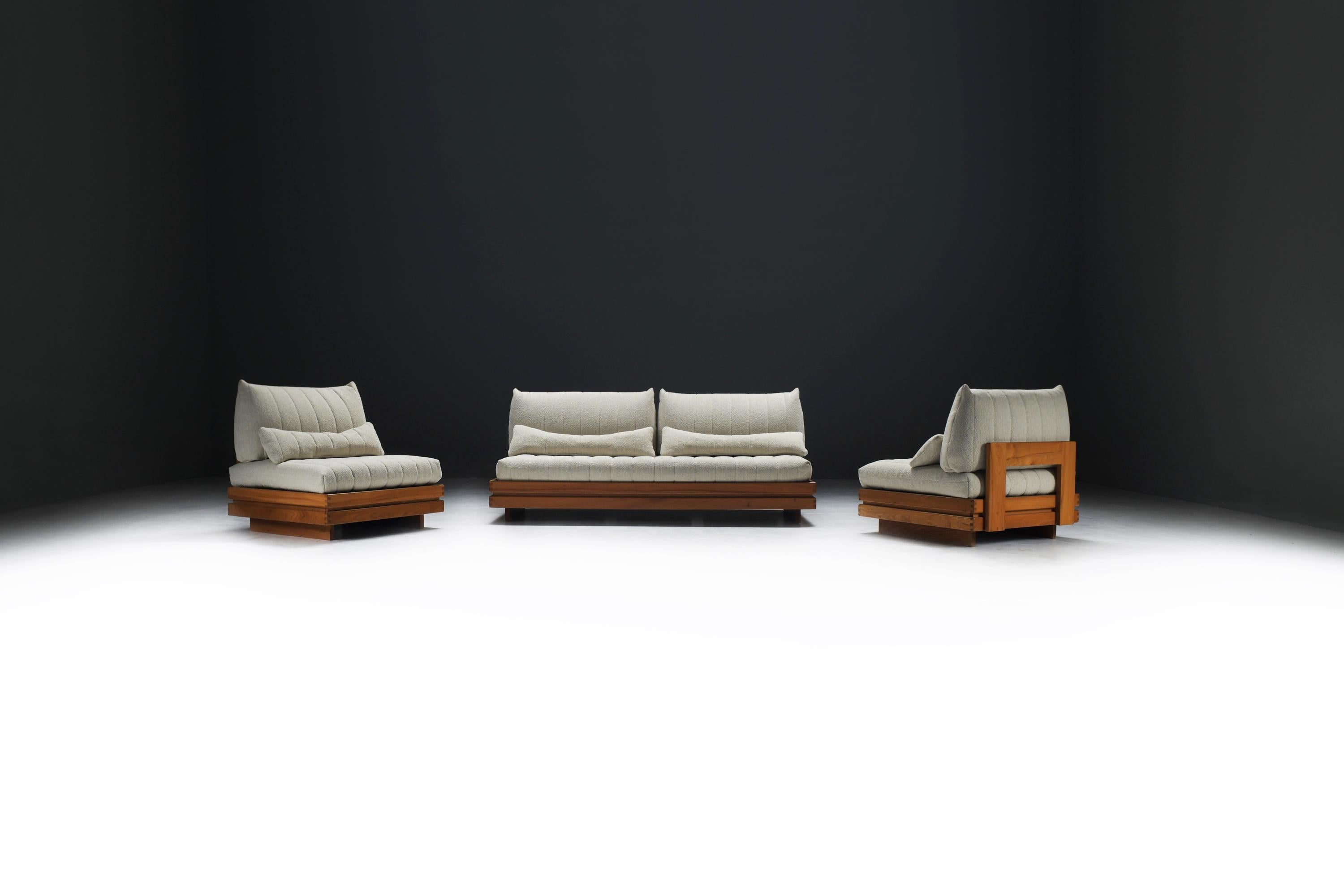 This elegant, minimalistic sofa set features a classic patinated elmwood frame that beautifully complements the soft, ecru upholstery, creating a timeless, sophisticated aesthetic. 
Expertly reupholstered with high-quality fabric while preserving