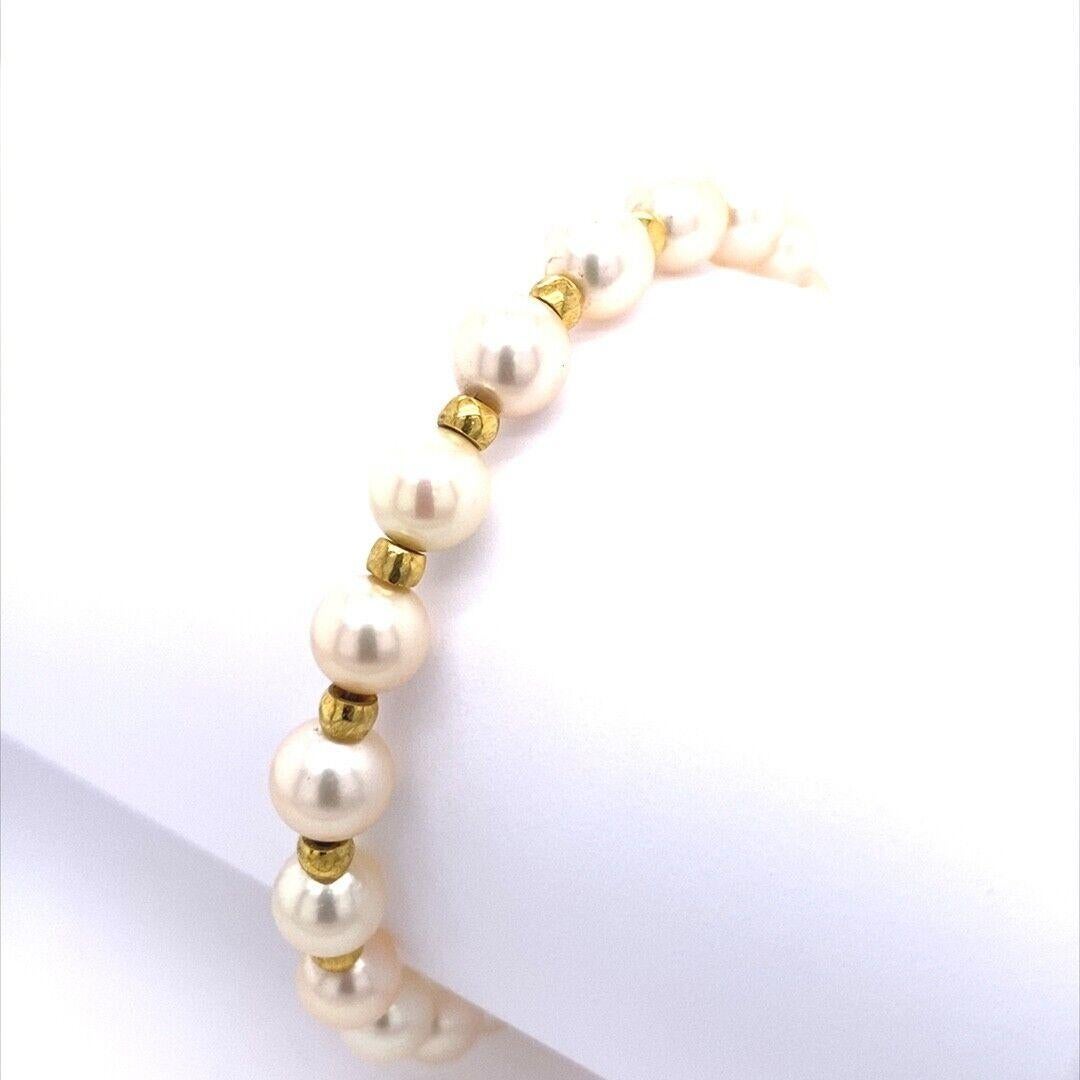 Perfect Matching 7mm Cultured Pearl Bracelet With 9ct Gold Beads in between.

Additional Information: 
Total Weight: 14.7g
Bracelet Length: 8''
Bracelet Width: 7.0mm
SMS6279