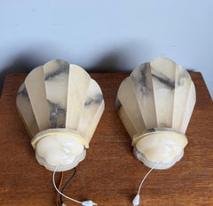 Perfect Pair Art Deco Hand-Carved Alabaster Fan Wall Sconces, circa 1920s