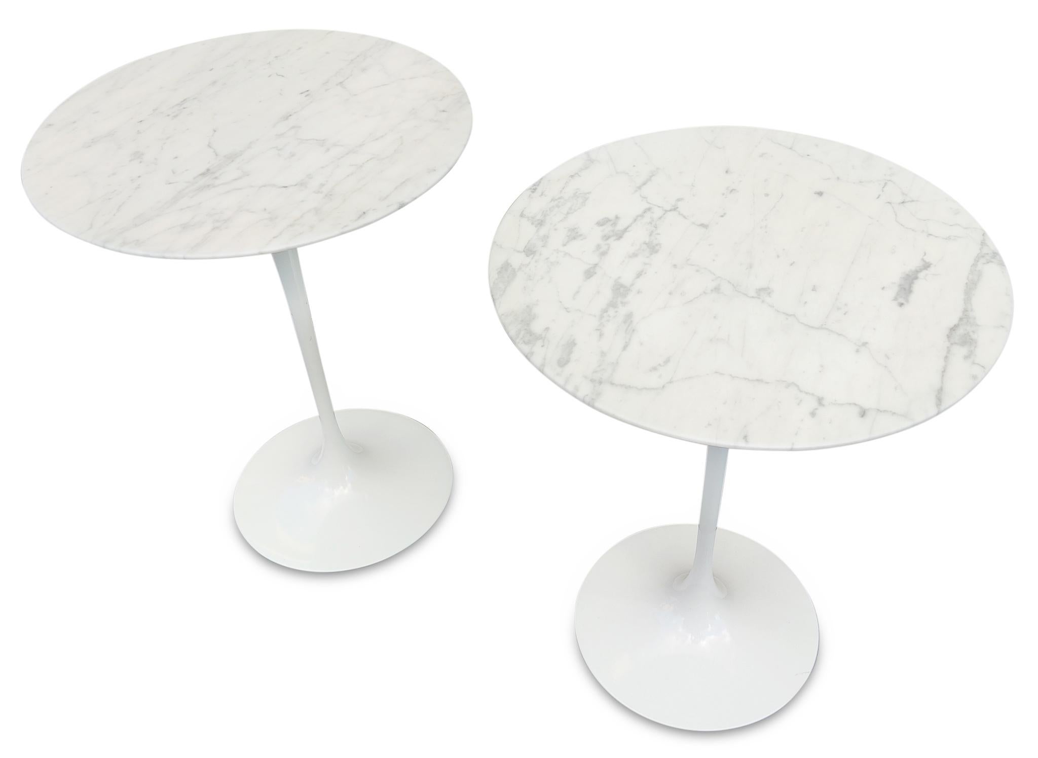 Pair of contemporary, Eero Saarinen for KnollStudio, signed marble top side tables. The tops are round, 16