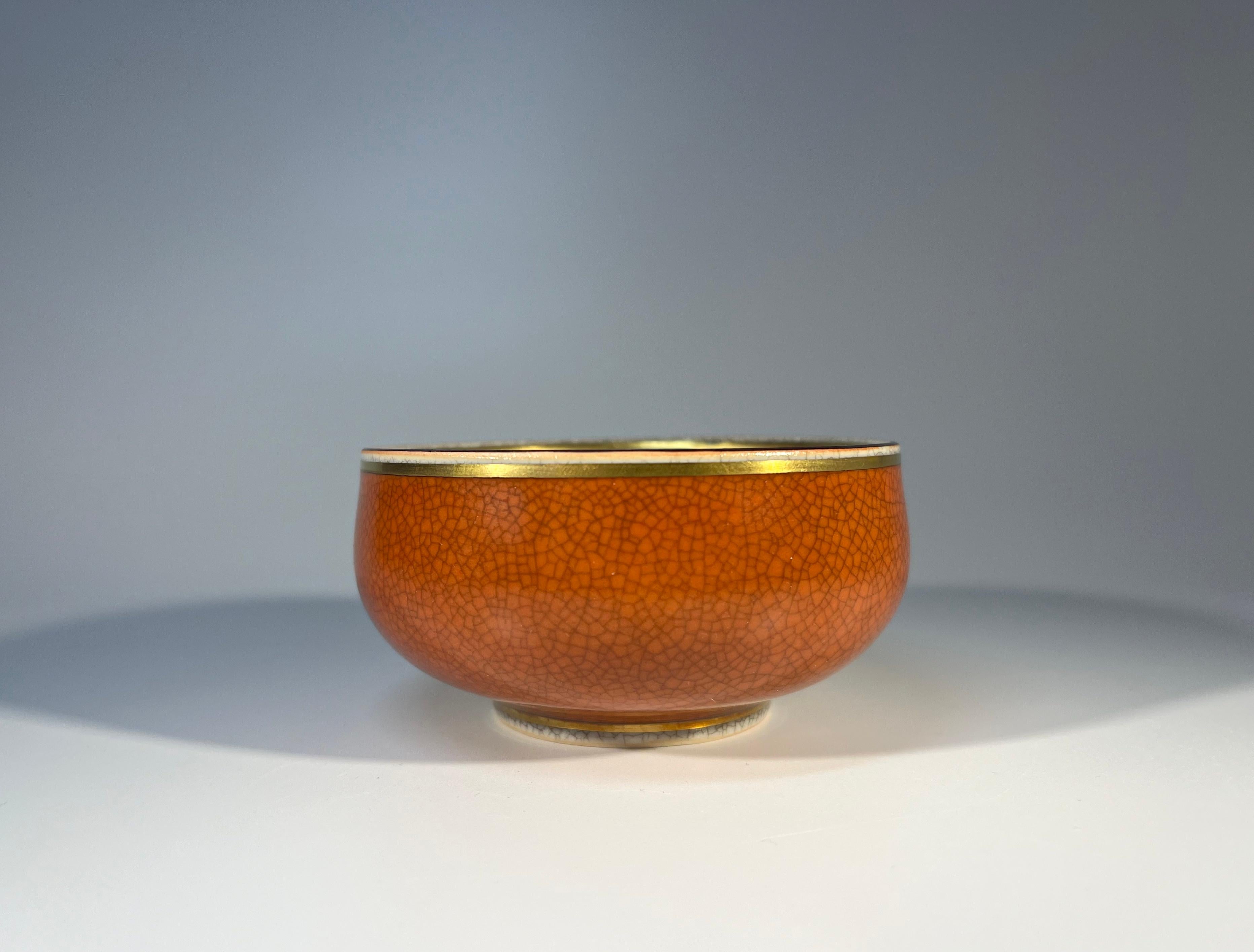 The crackle glaze is wonderfully emphasised on this small bowl by Thorkild Olsen for Royal Copenhagen
Rich terracotta and mid grey colouring with gilded banding - terrific combination
Circa 1960's
Stamped Denmark 2690
Height 2 inch, Diameter 3.5
