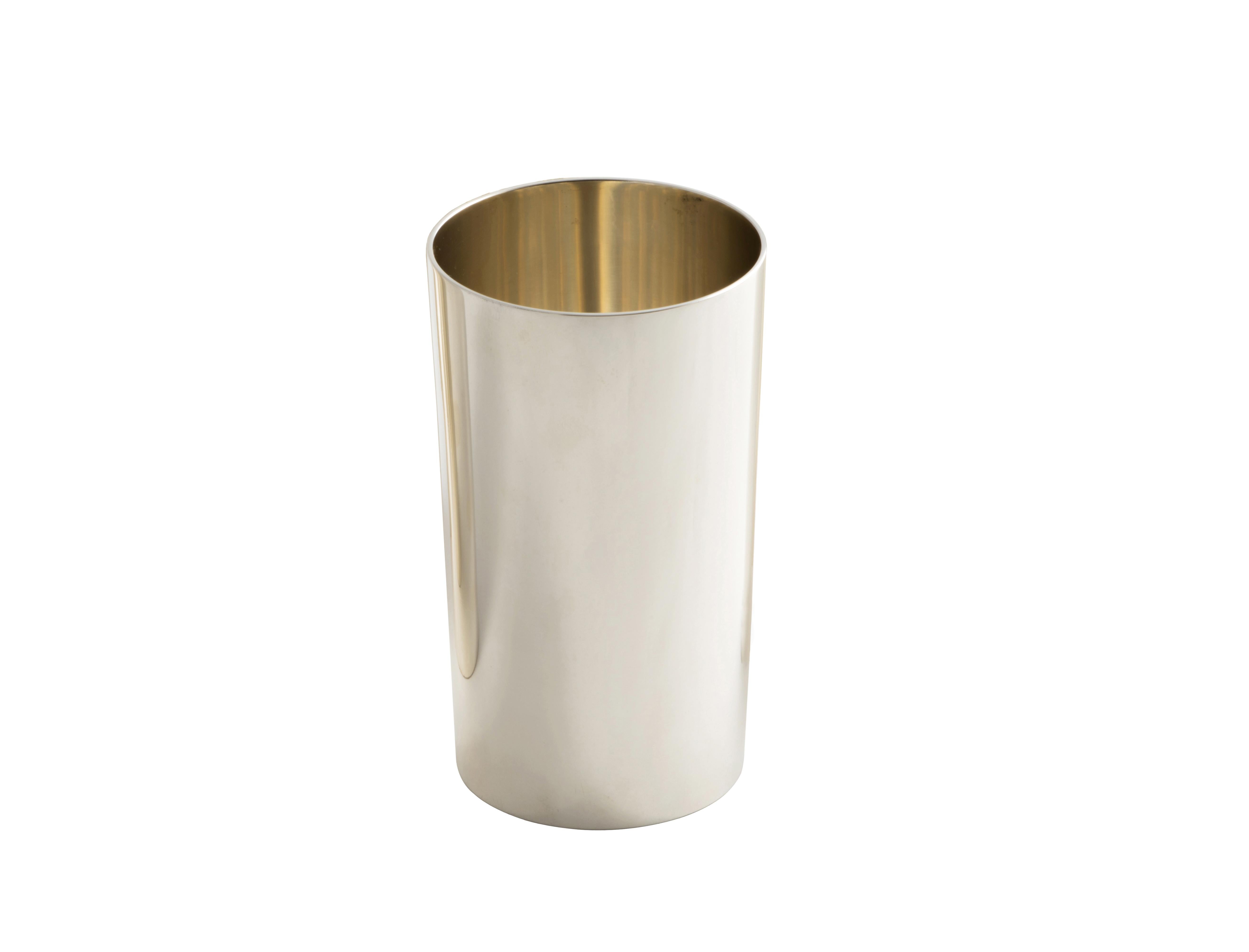 A flawlessly modern mint julep cup / highball tumbler in sterling silver by Tiffany. Its Spartan form and exceptional weight provide for an incredible feel in the hand. It also makes for a beautiful bud vase. Incredibly clean (likely never used) and