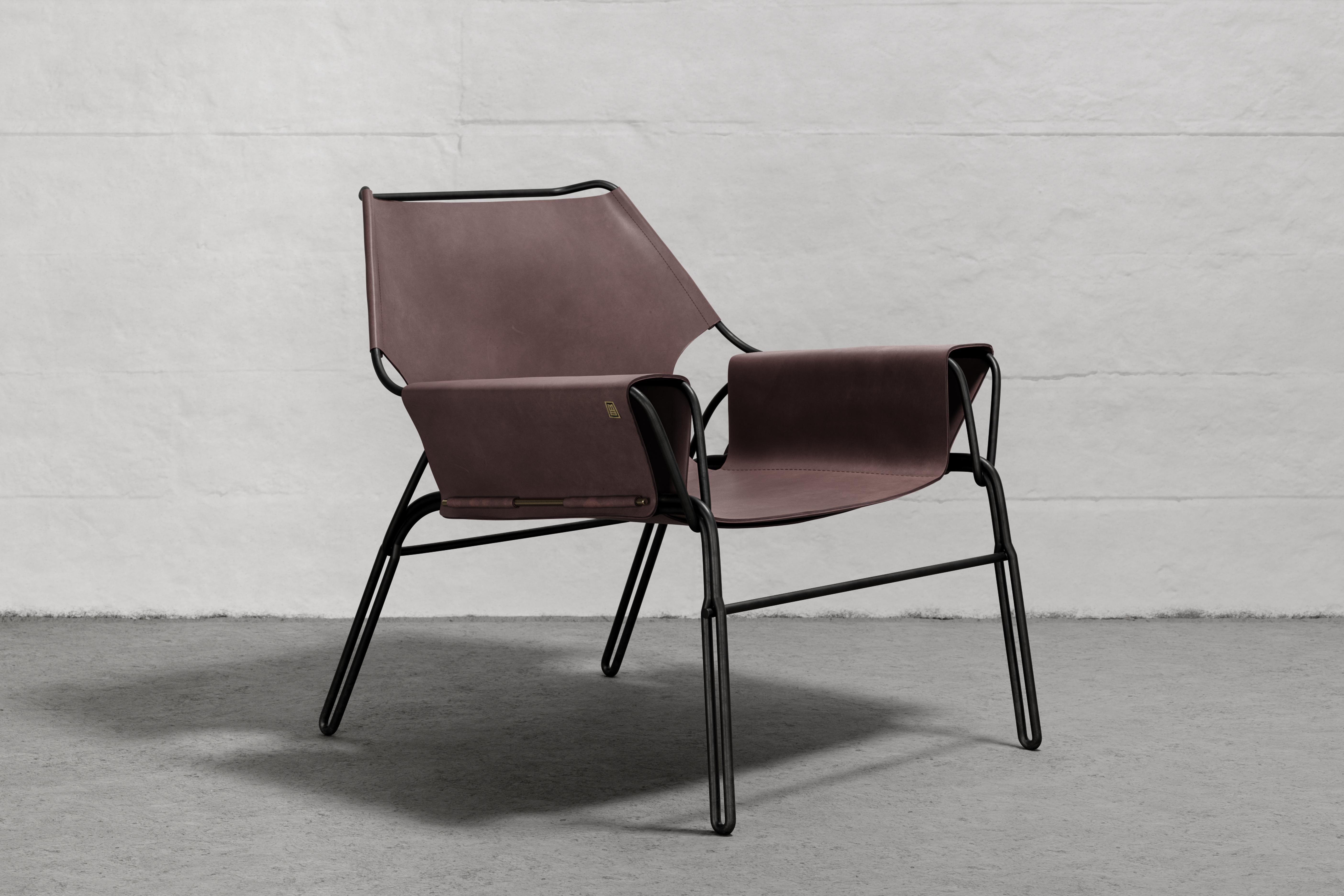 Lounge chair made of black finish steel rod structure, Ecuadorian cowhide leather seat, and lathed bronze or stainless steel hardware. Available in Olivo, Brown, and Cognac thick leather options.

The first Perfidia collection, composed of 4 pieces