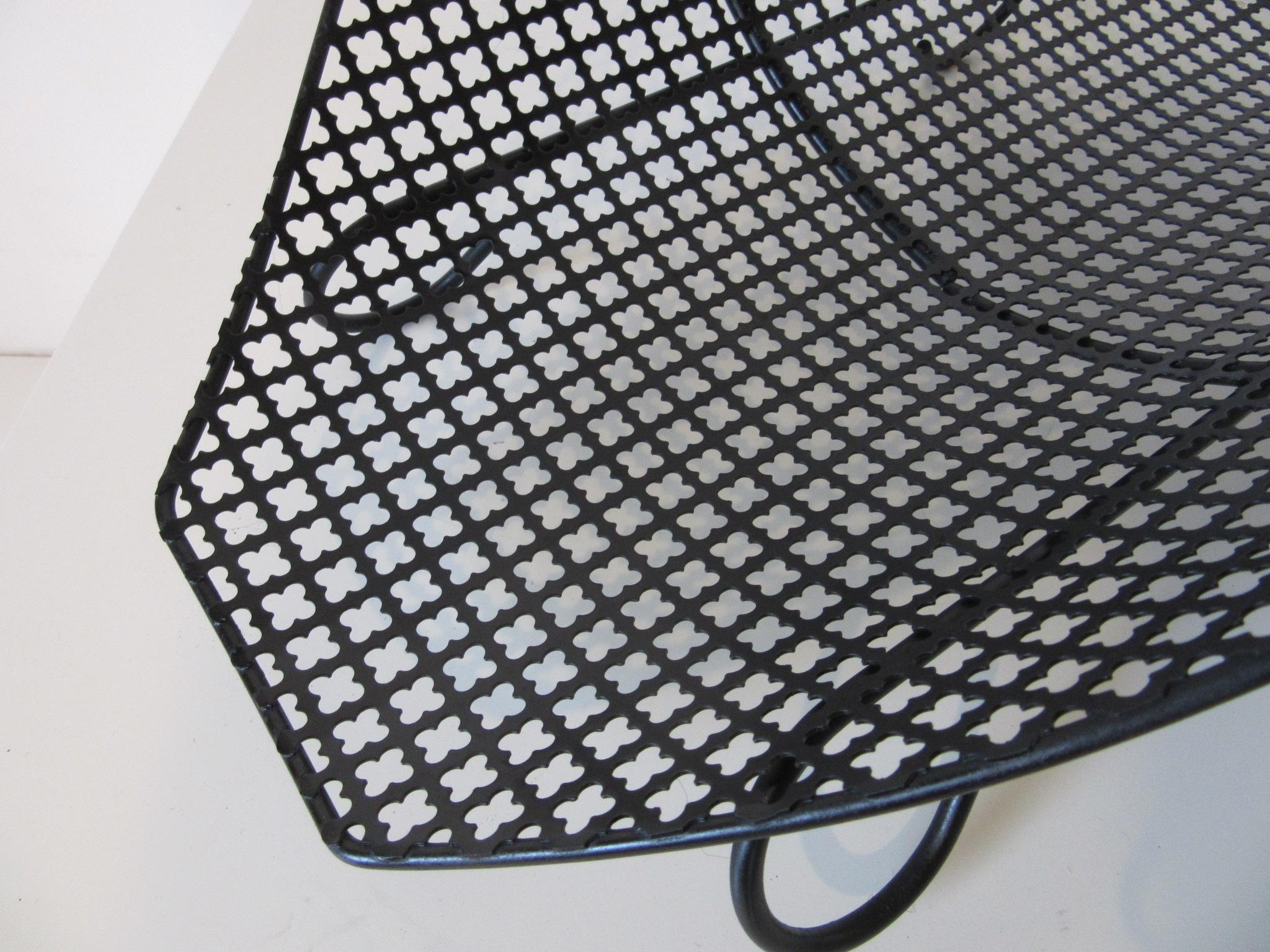 Unknown Perforated Magazine Rack / Log Holder in the manner of Mathieu Matégot