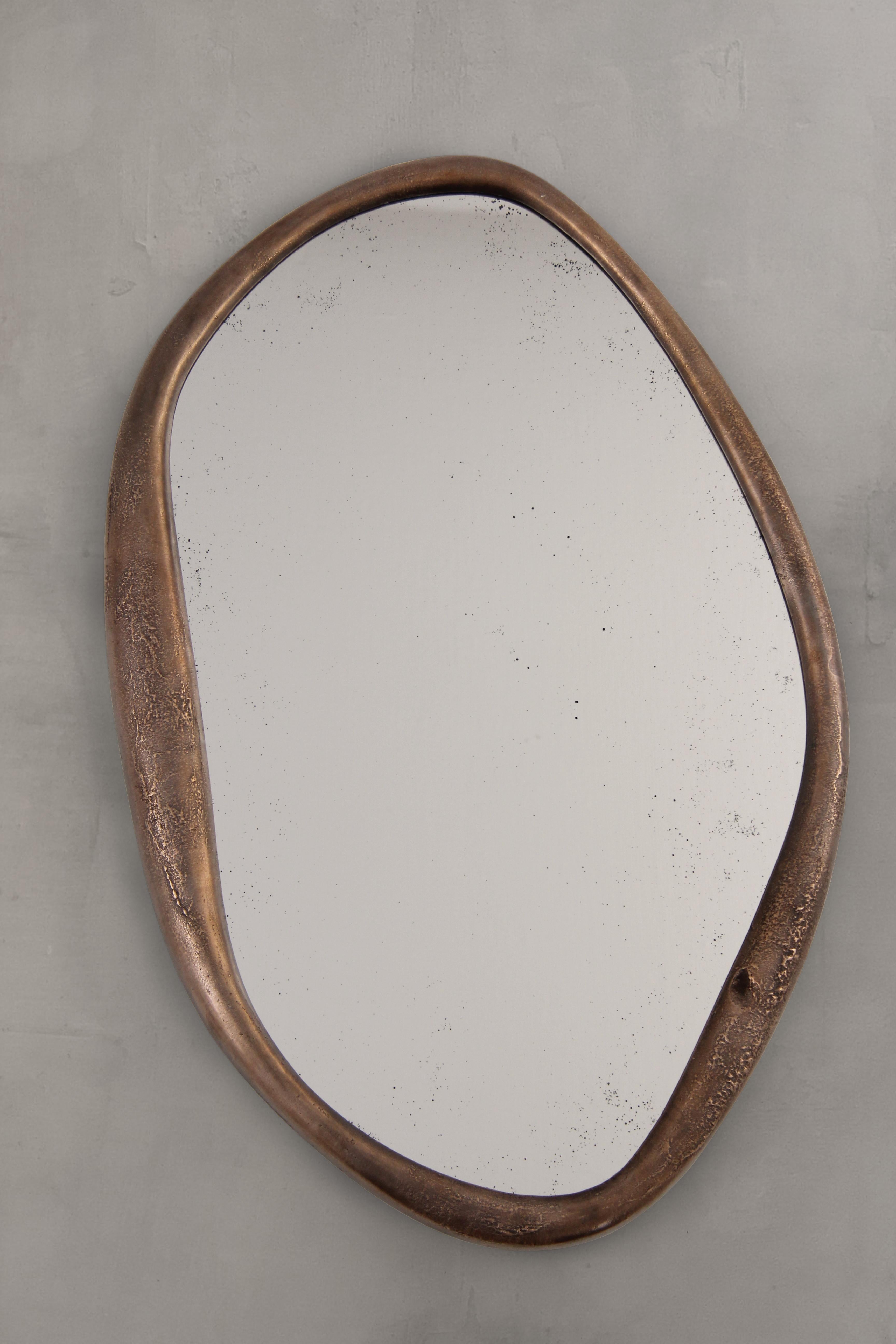 Perfumer Extra Large Wall Mirror With Hand-Molded Bronze Frame by Vogel Studio
Dimensions: Ø 71 x H 107 cm.
Materials: Cast bronze and mirror.

Available in three different sizes. Prices and dimensions may vary. Please contact us.

For a famous