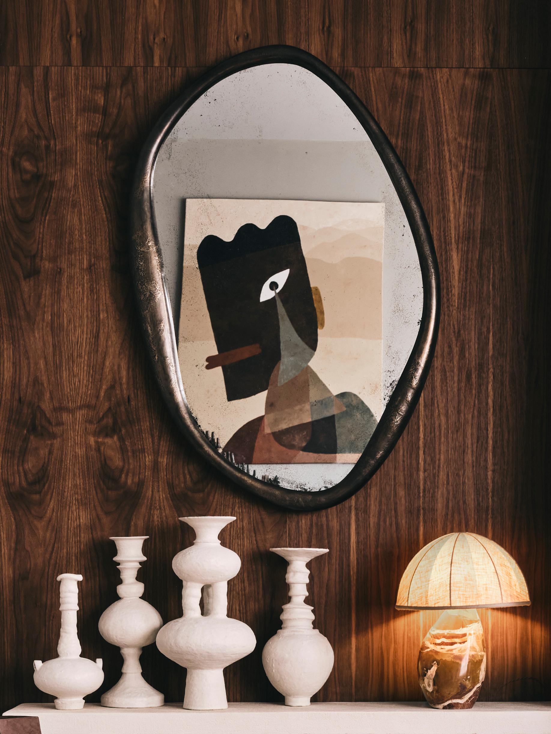 Perfumer Large Wall Mirror With Hand-Molded Bronze Frame by Vogel Studio
Dimensions: Ø 53,7 x H 80,7 cm.
Materials: Cast bronze and mirror.

Available in three different sizes. Prices and dimensions may vary. Please contact us.

For a famous