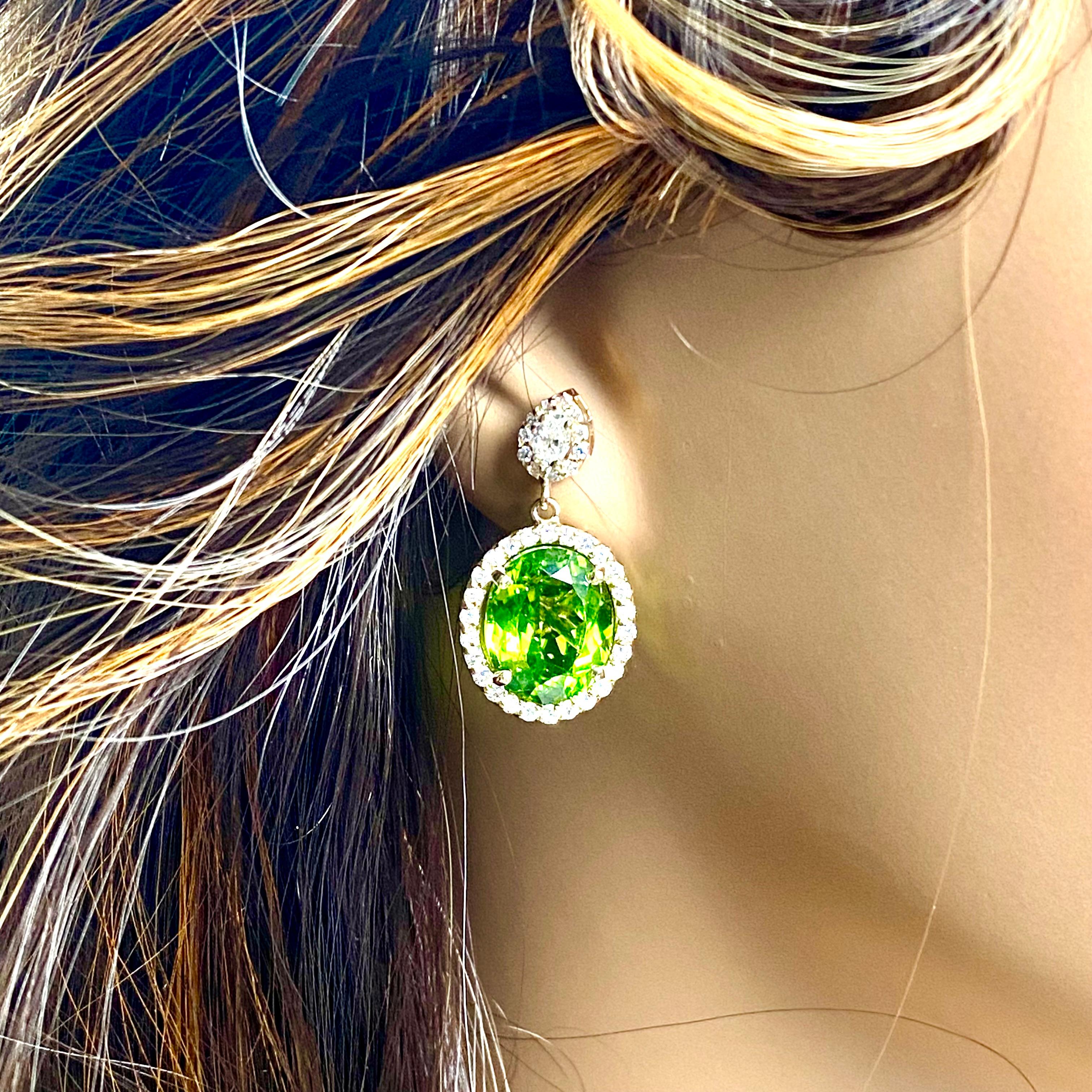 Peridot 13.10 Carat Pear Diamonds 1.75 Carat Halo 1.10 Inch Long Gold Earrings For Sale 5