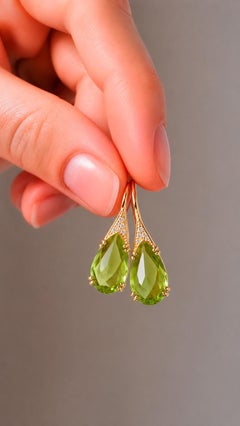 Orecchini in oro 14k con peridoto
