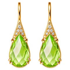 Orecchini in oro 14k con peridoto