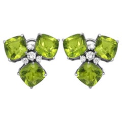 Peridot 18.00Cttw And Diamond 0.50Cttw Stud Earrings 18K White Gold