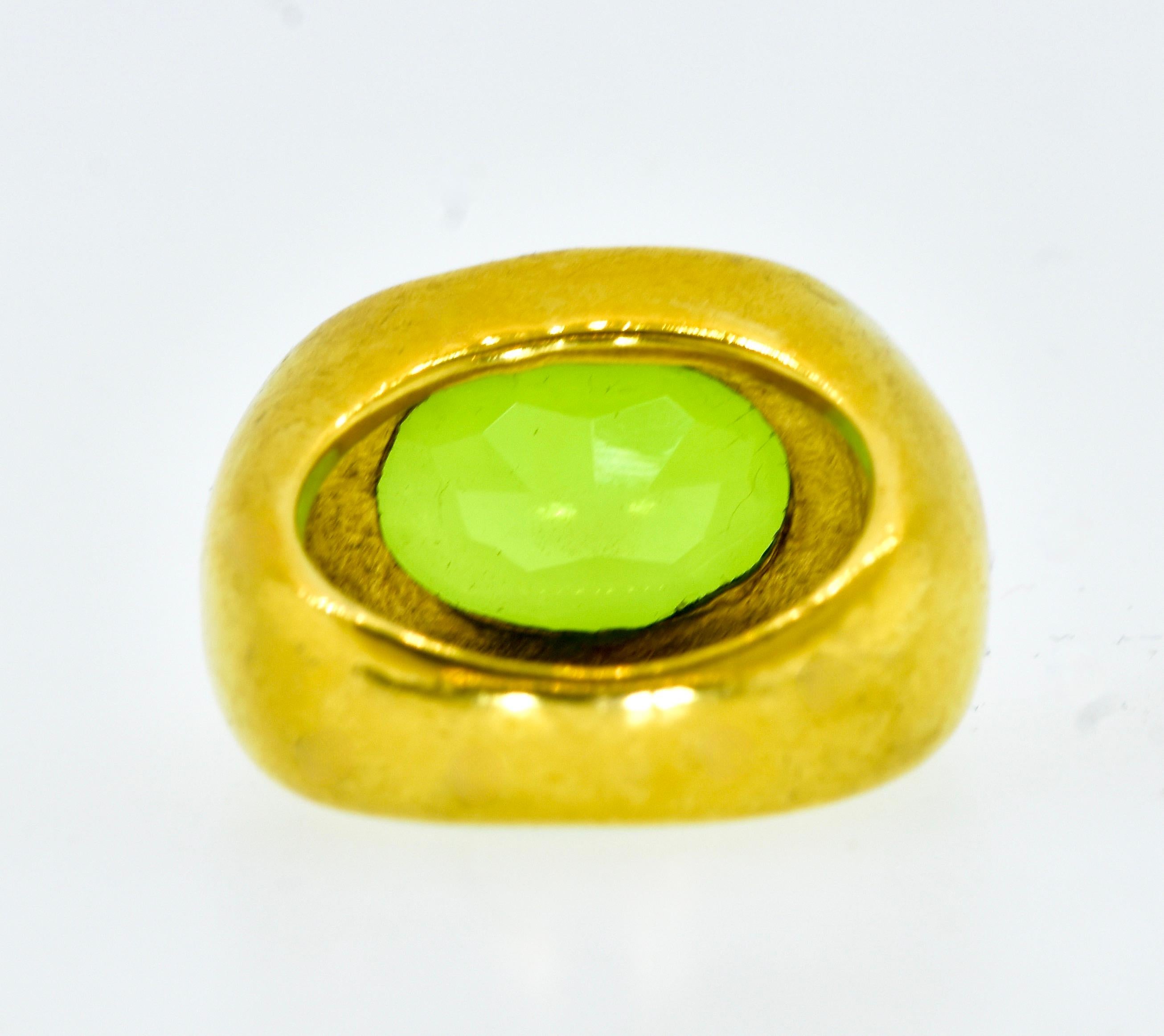 Contemporary  Peridot 8 cts., Very Fine Quality set in an 18K Yellow Gold Vintage Ring For Sale