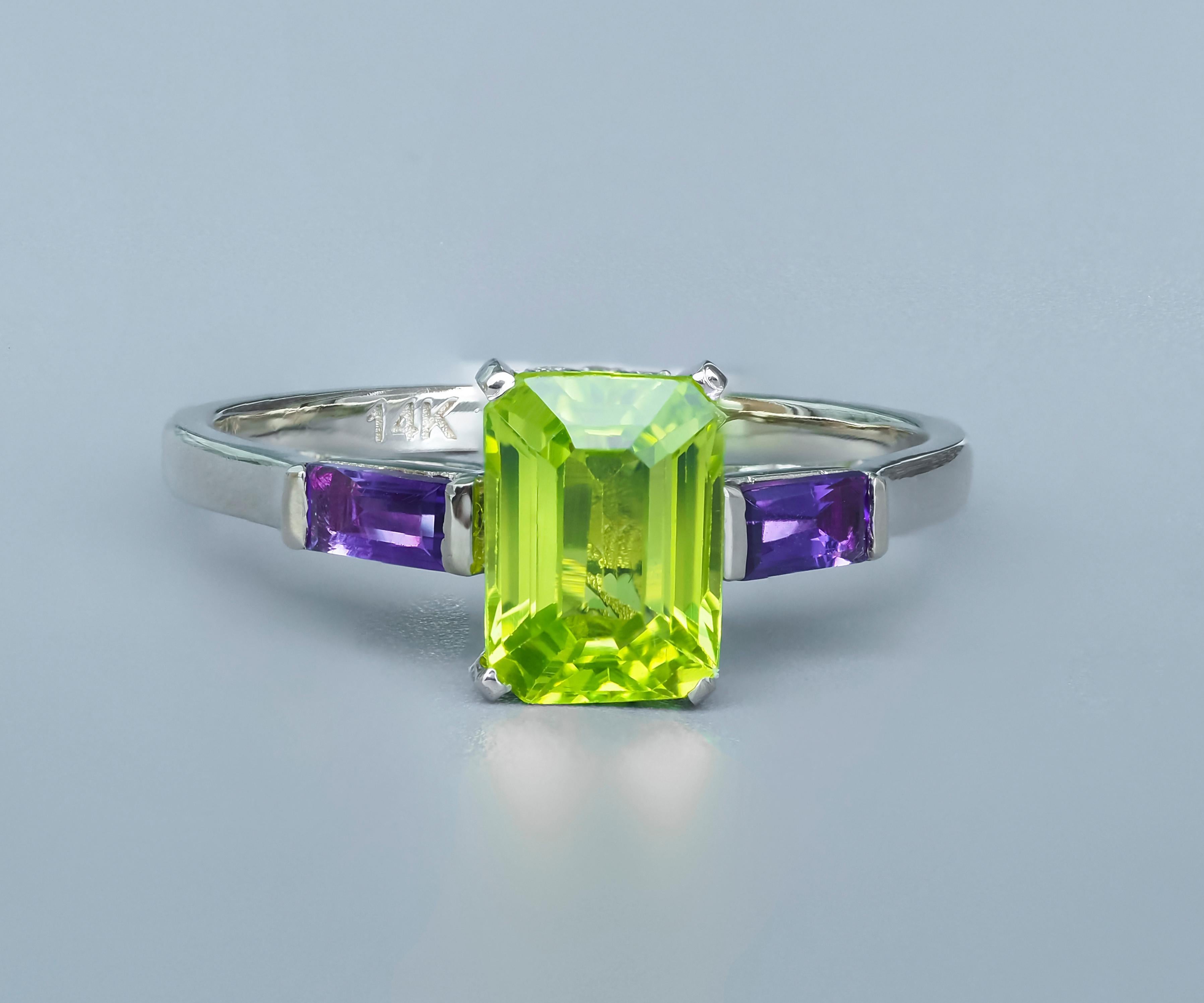 Peridot, Amethyst 14k gold ring. 
Apple green peridot, purple amethyst ring. Baguette cut engagement ring. 3 gemstone ring.

Metal: 14k gold
Weight: 2.31 g. depends from size.

Set with peridot, color - green
Baguette cut, aprx 0.70 ct. in total