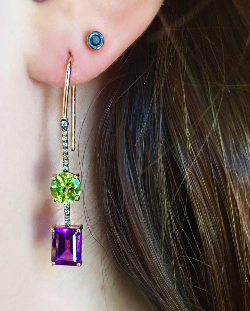 This collection is inspired by the Mediterranean sea and its eternity. 
Peridot amethyst cognac diamond earrings with 14k rose gold by Selda Jewellery

Additional Information:-
Collection: Waves Collection
14k Rose gold
0.1ct Cognac diamond
3ct