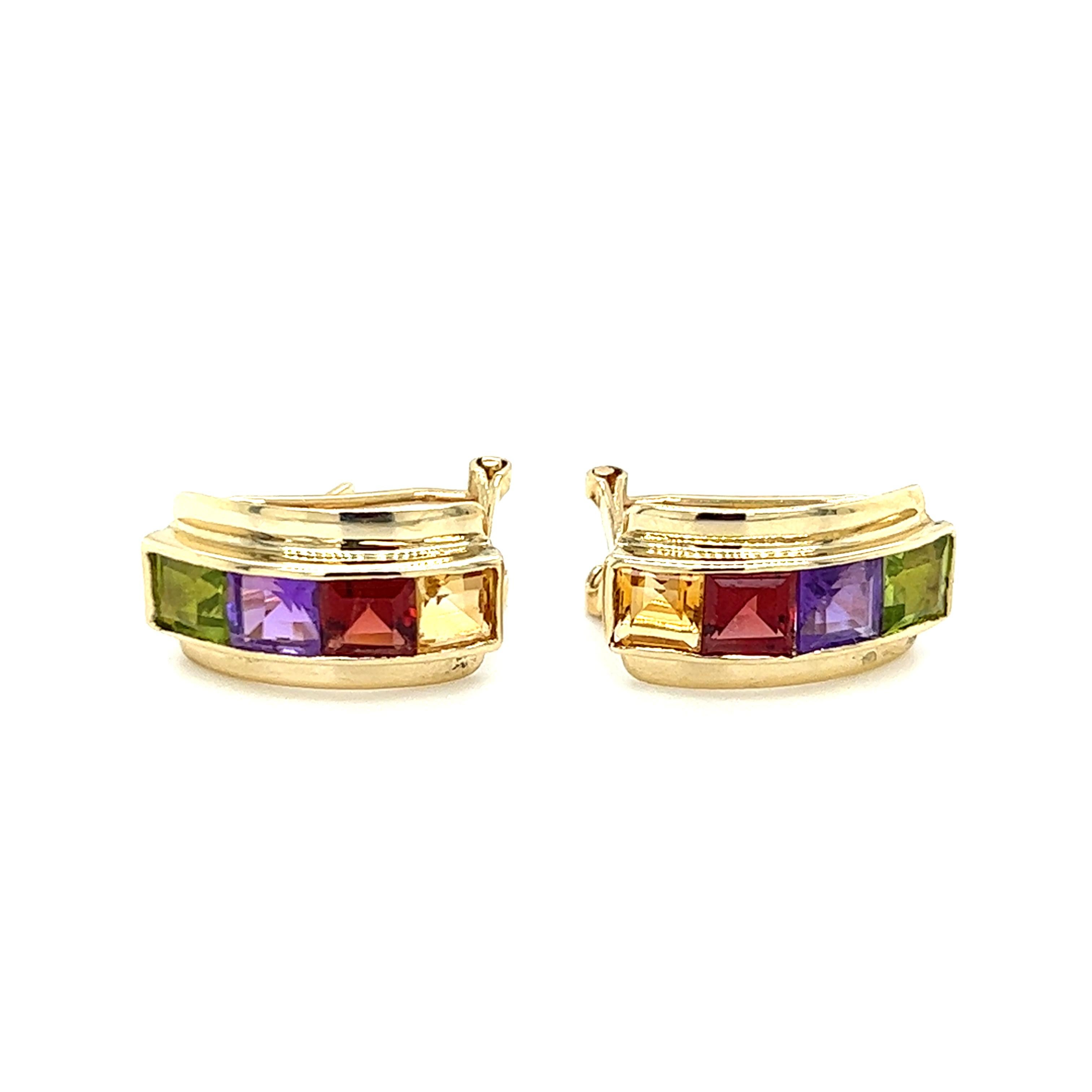 One pair of 14-karat yellow gold earrings, each set with one 4.30x3.80mm peridot, amethyst, garnet, and citrine.  The earrings measure 15.75mm long and 8.40mm wide and are complete with Omega backs.
